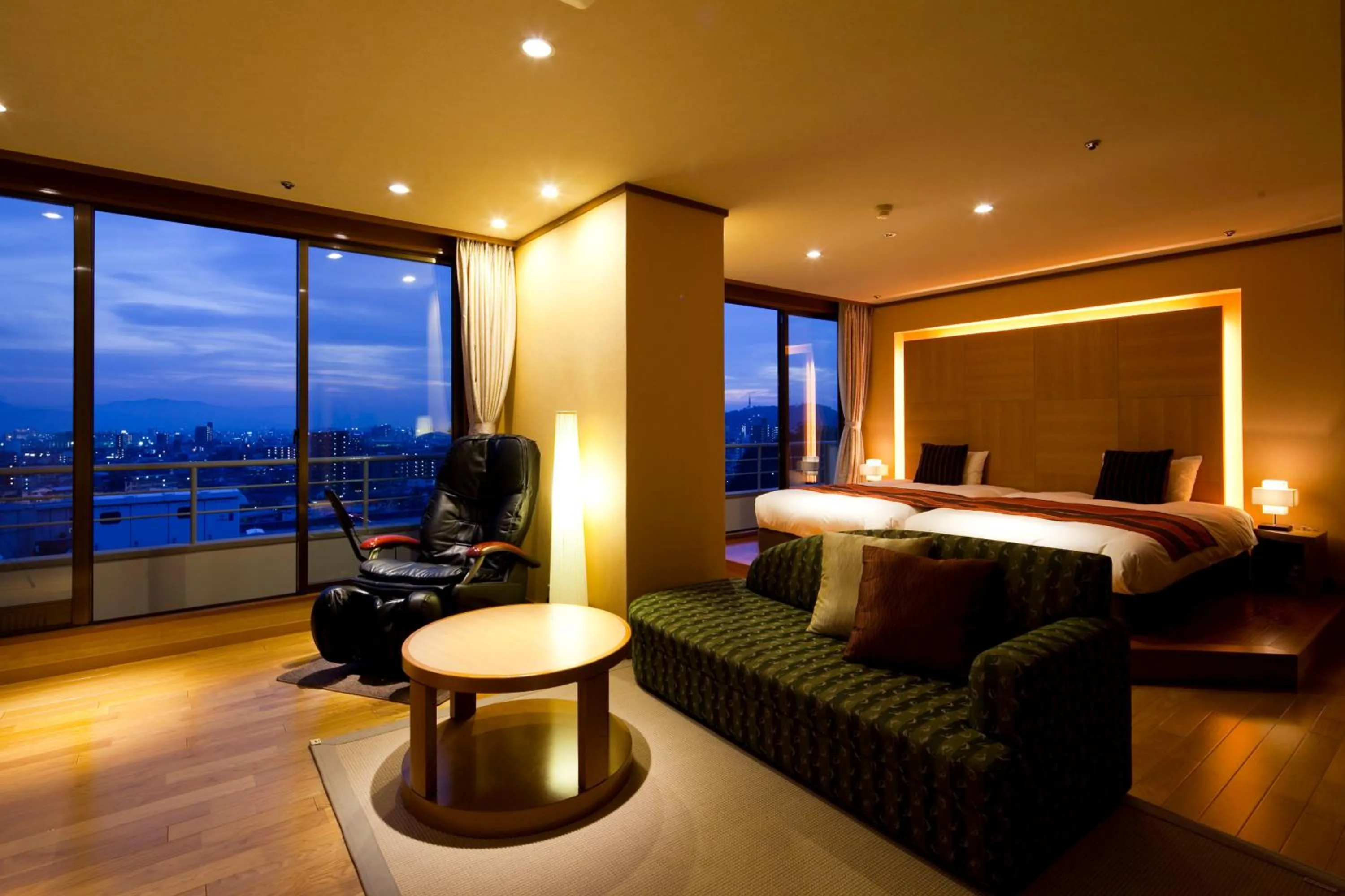 Living room, Bed in Dogo Prince Hotel