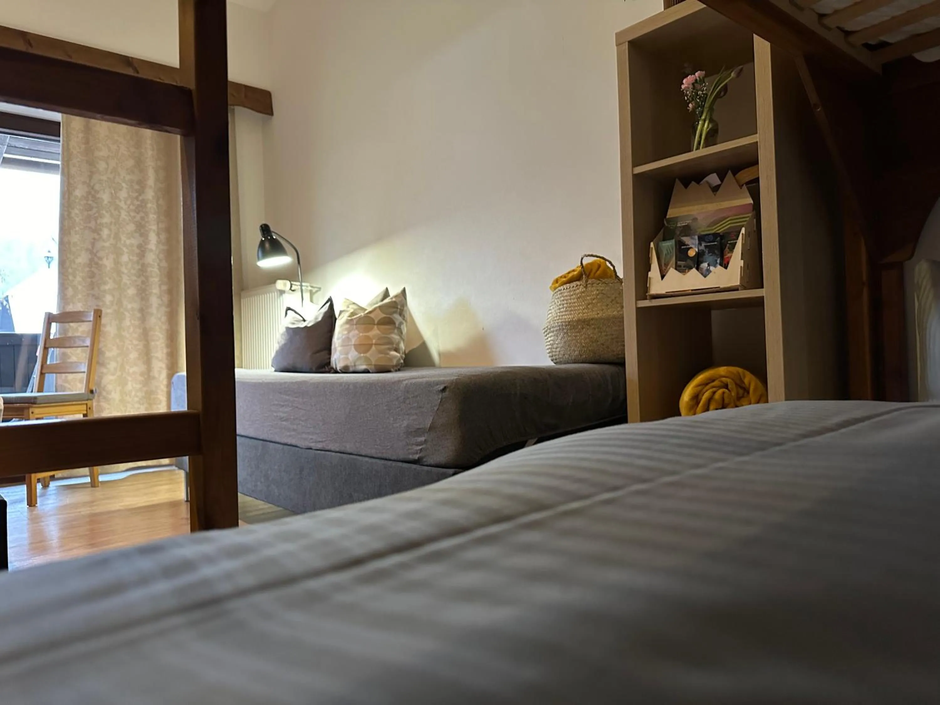 Bed in Pension Almhof Baumgarten