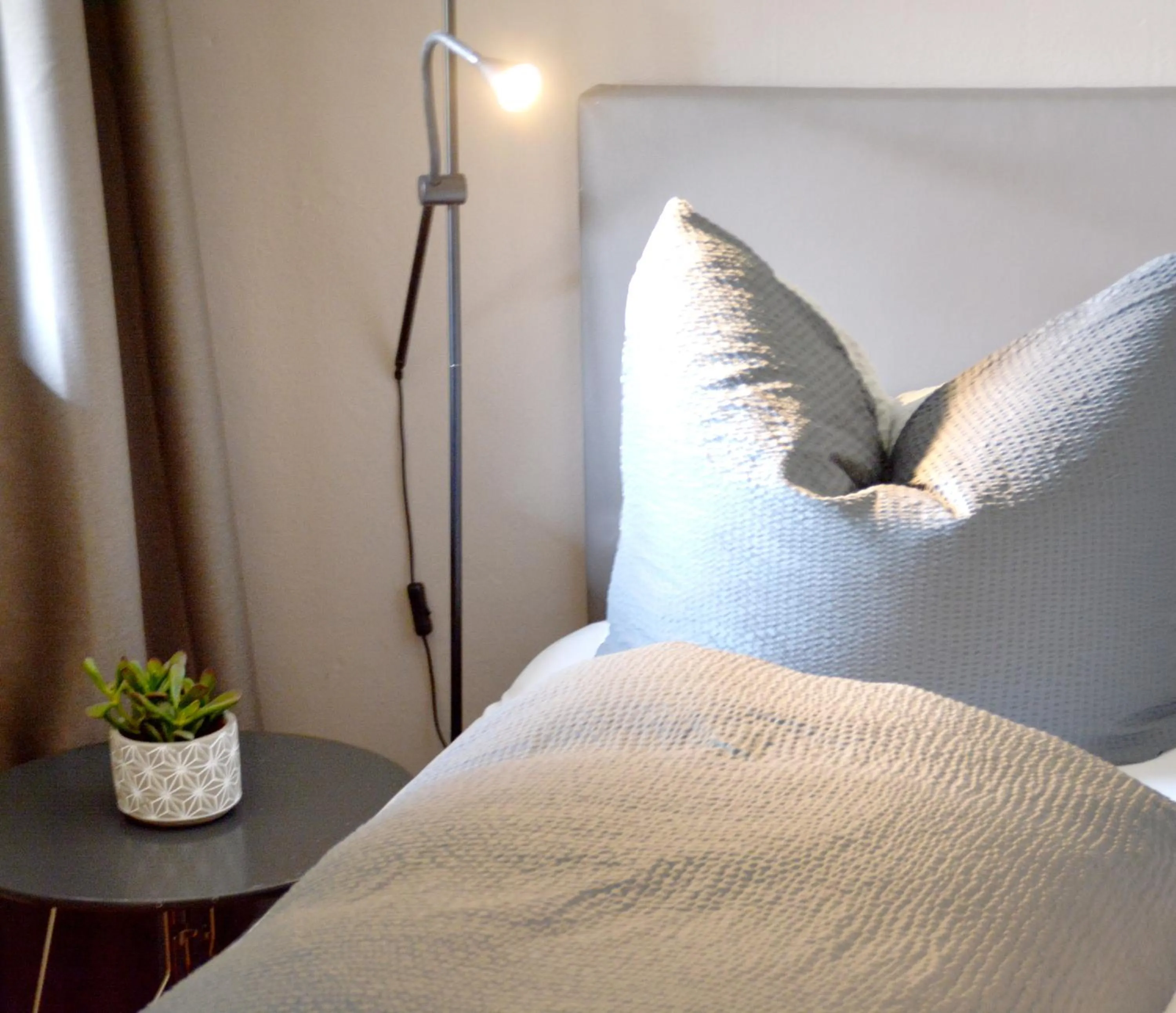 Bed in Pension Almhof Baumgarten