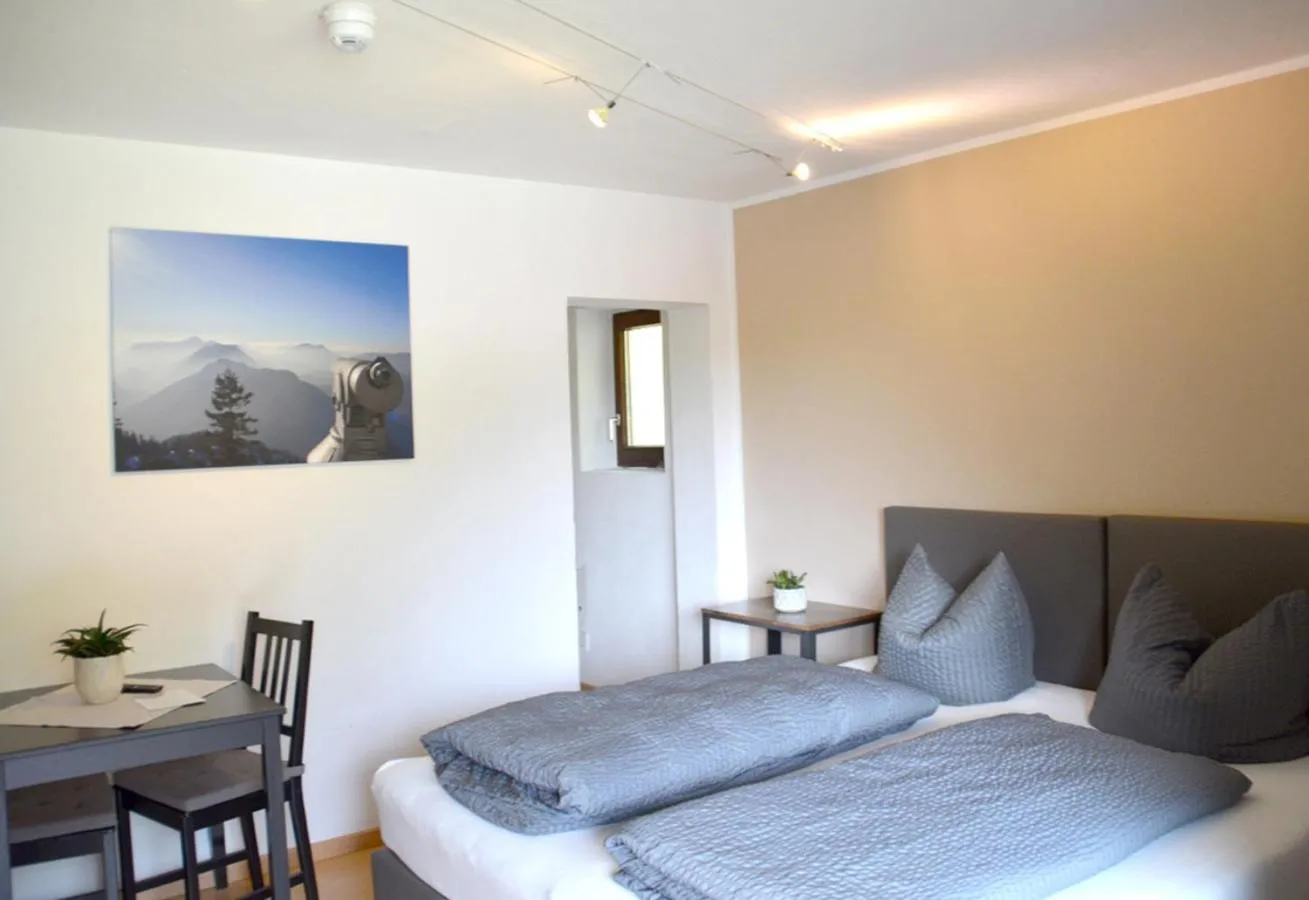 Bed in Pension Almhof Baumgarten