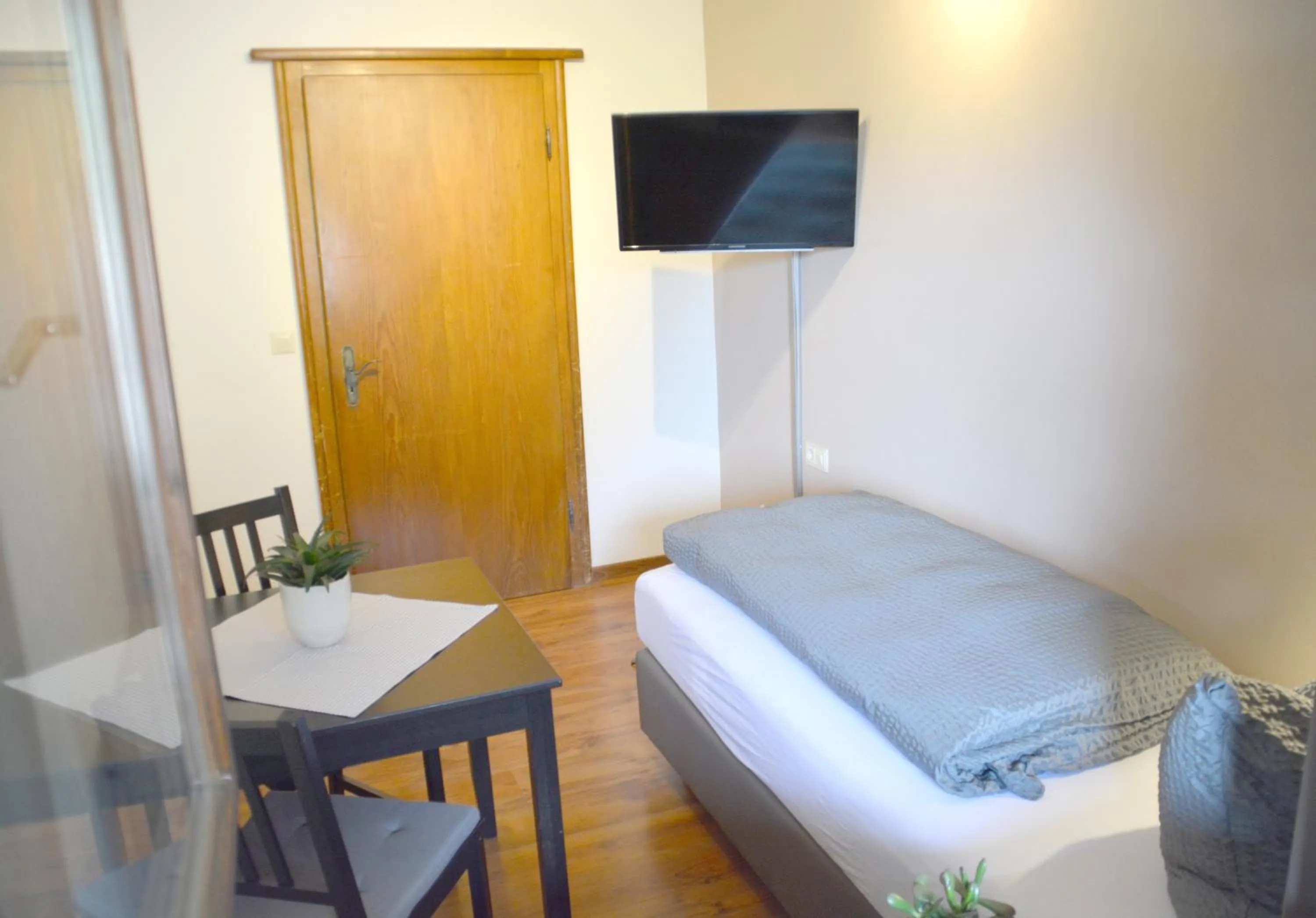 Bed in Pension Almhof Baumgarten