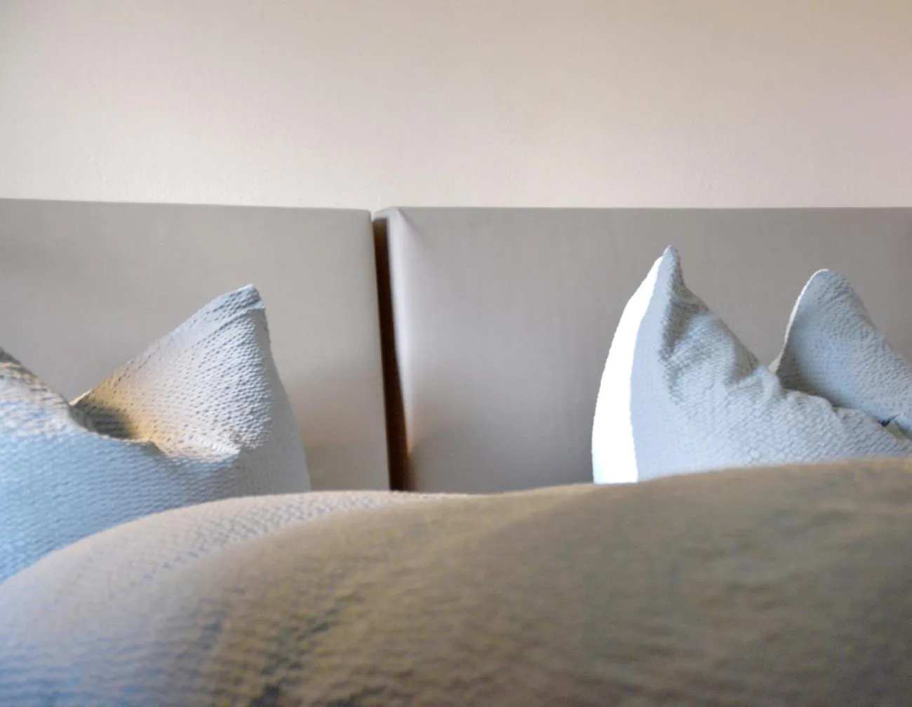 Bed in Pension Almhof Baumgarten