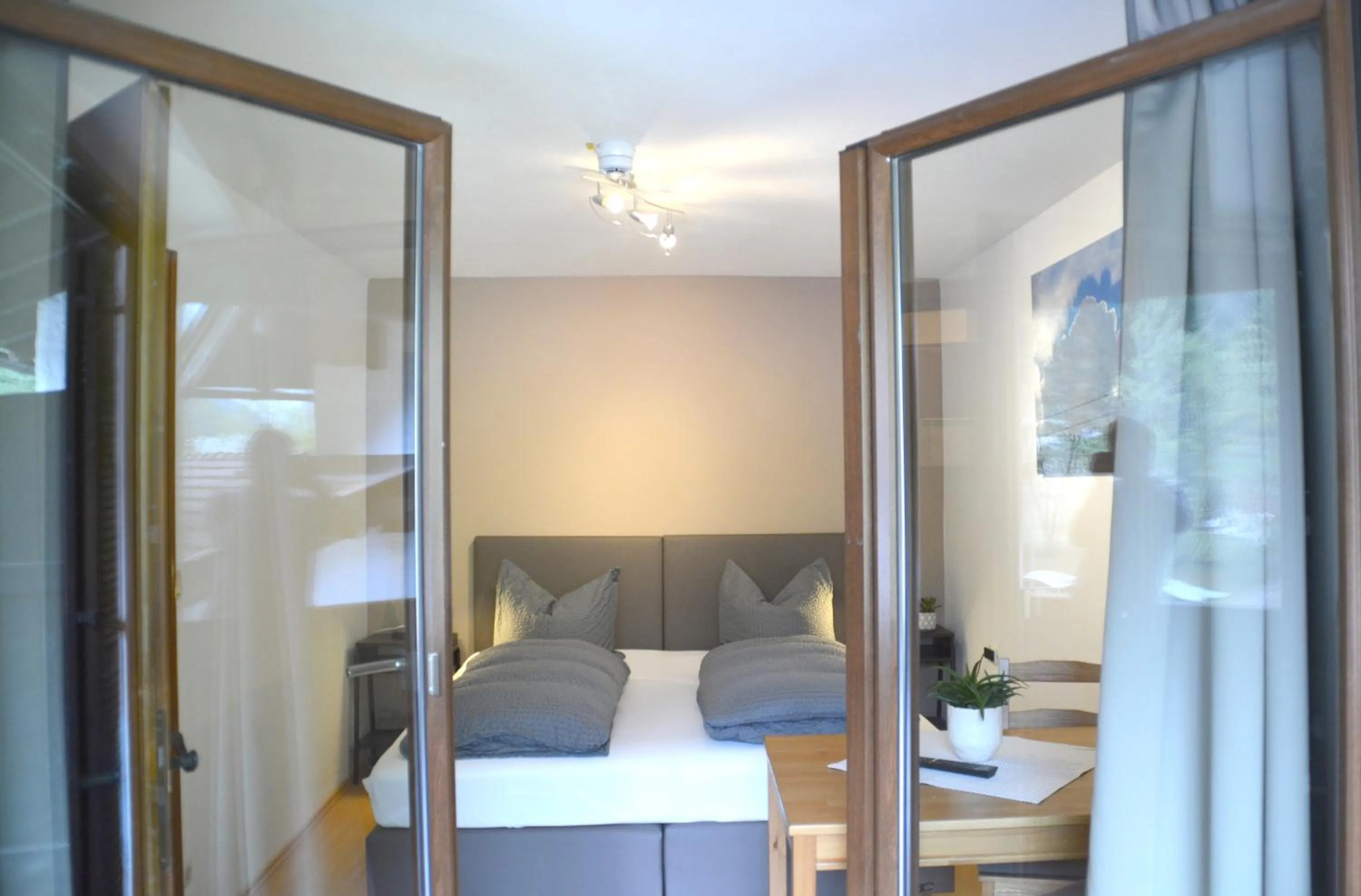 Bed in Pension Almhof Baumgarten