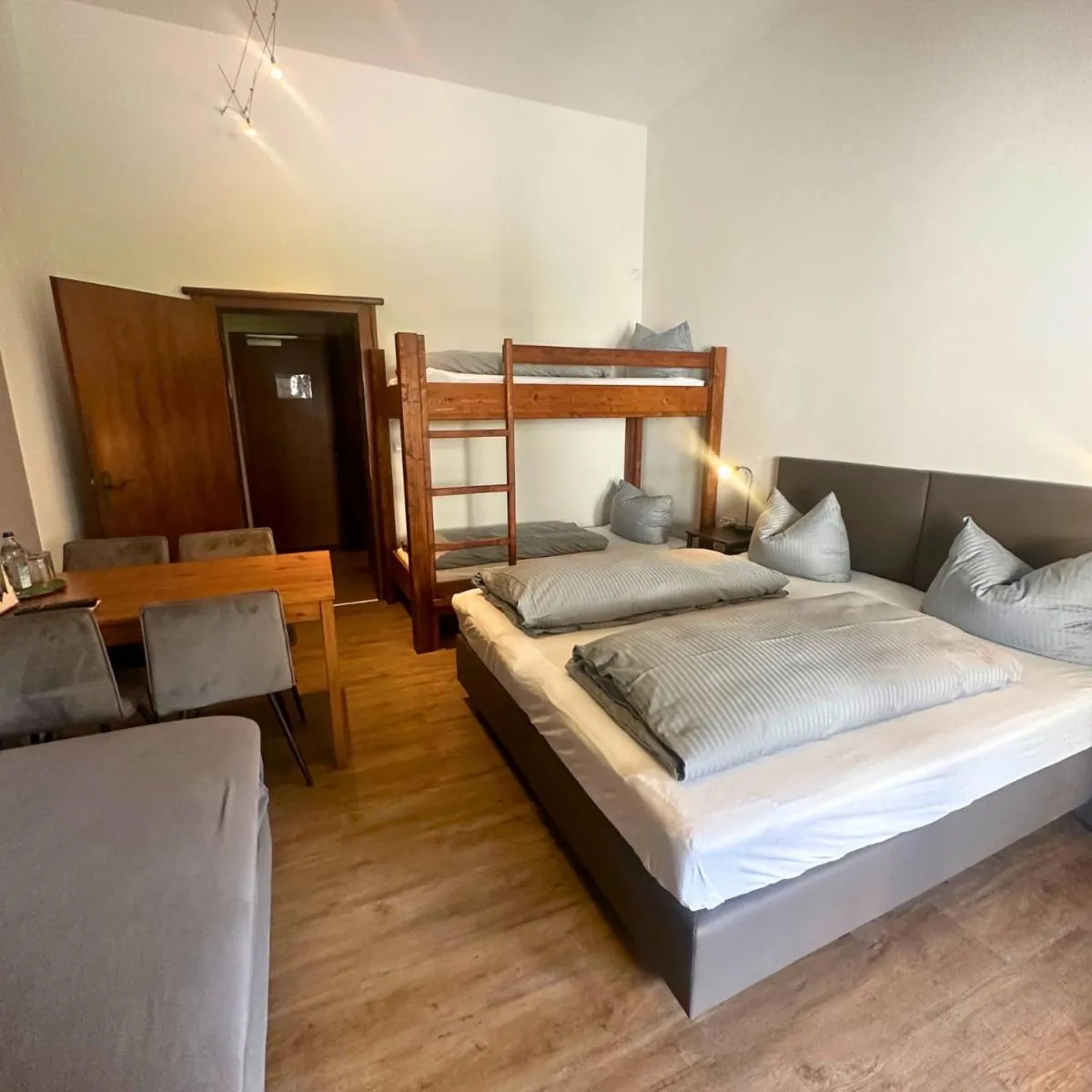 Seating area, Bed in Pension Almhof Baumgarten