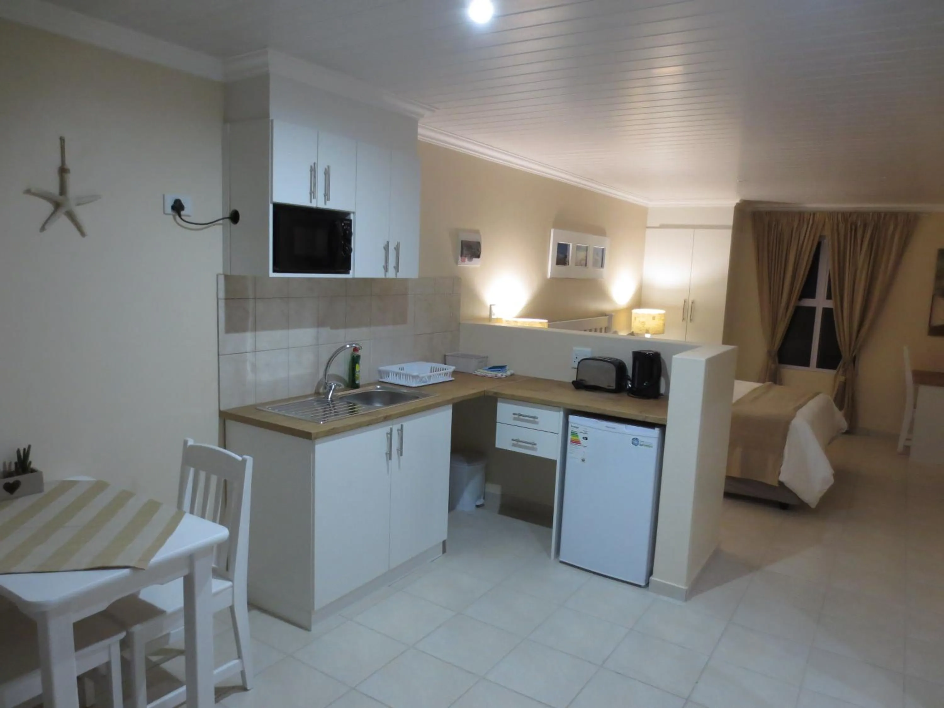 Kitchen or kitchenette in Masada Guest House