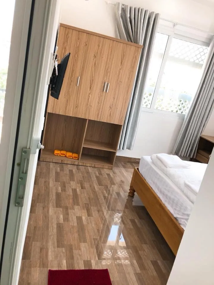 wardrobe, Bed in Anh Phat Hotel