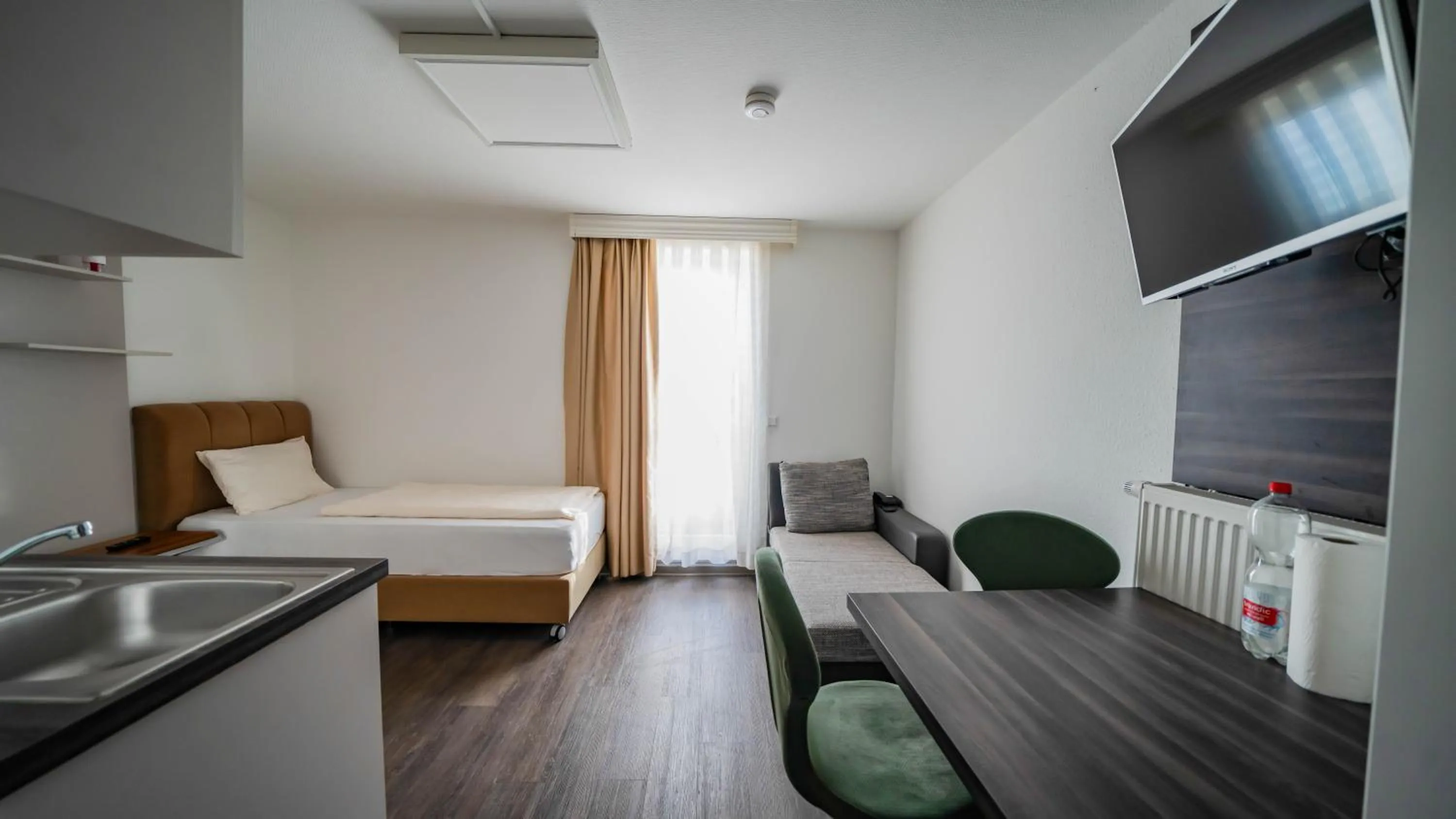 Bed in Comfort Boardinghouse