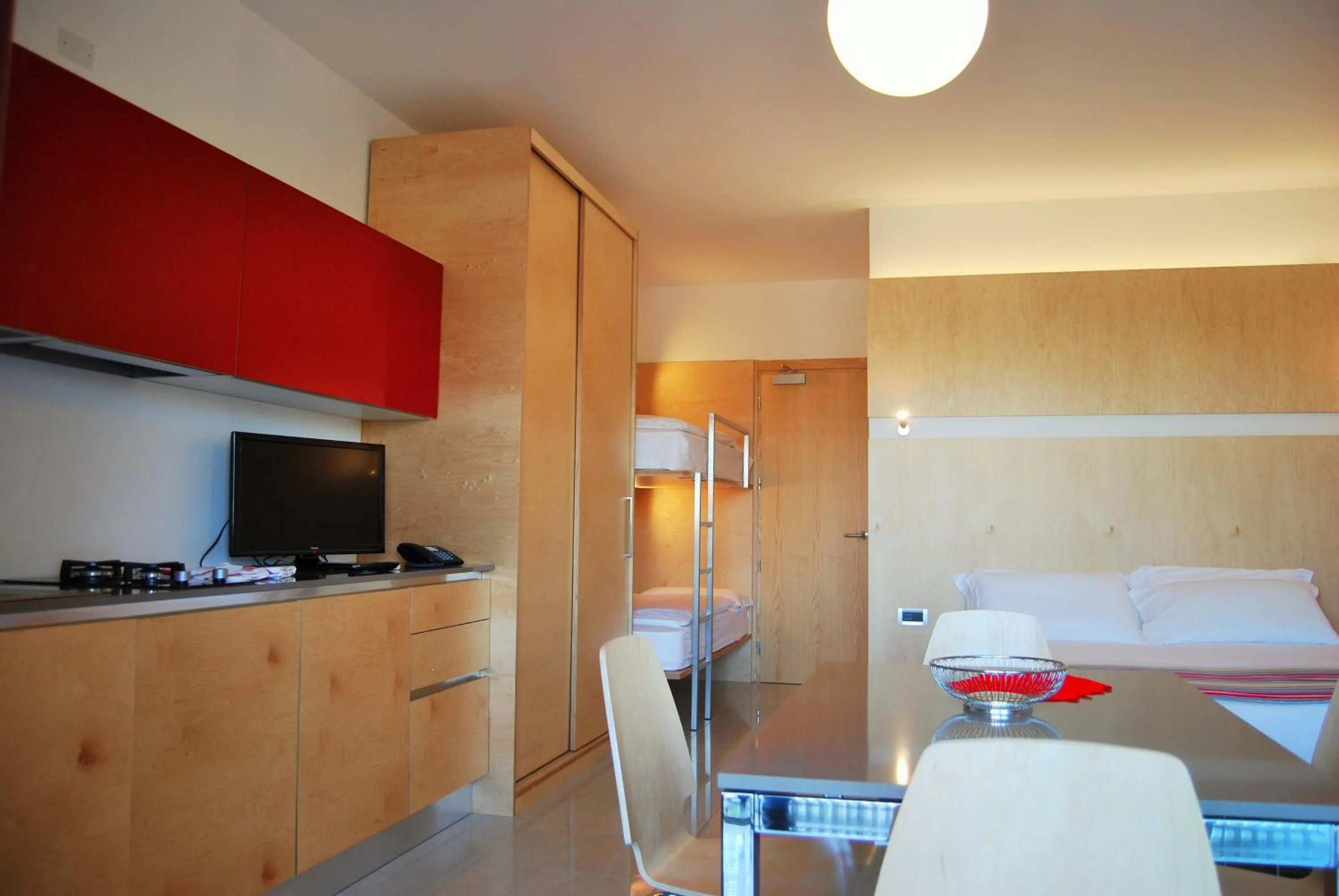 Kitchen or kitchenette, Bed in Aparthotel Albatros
