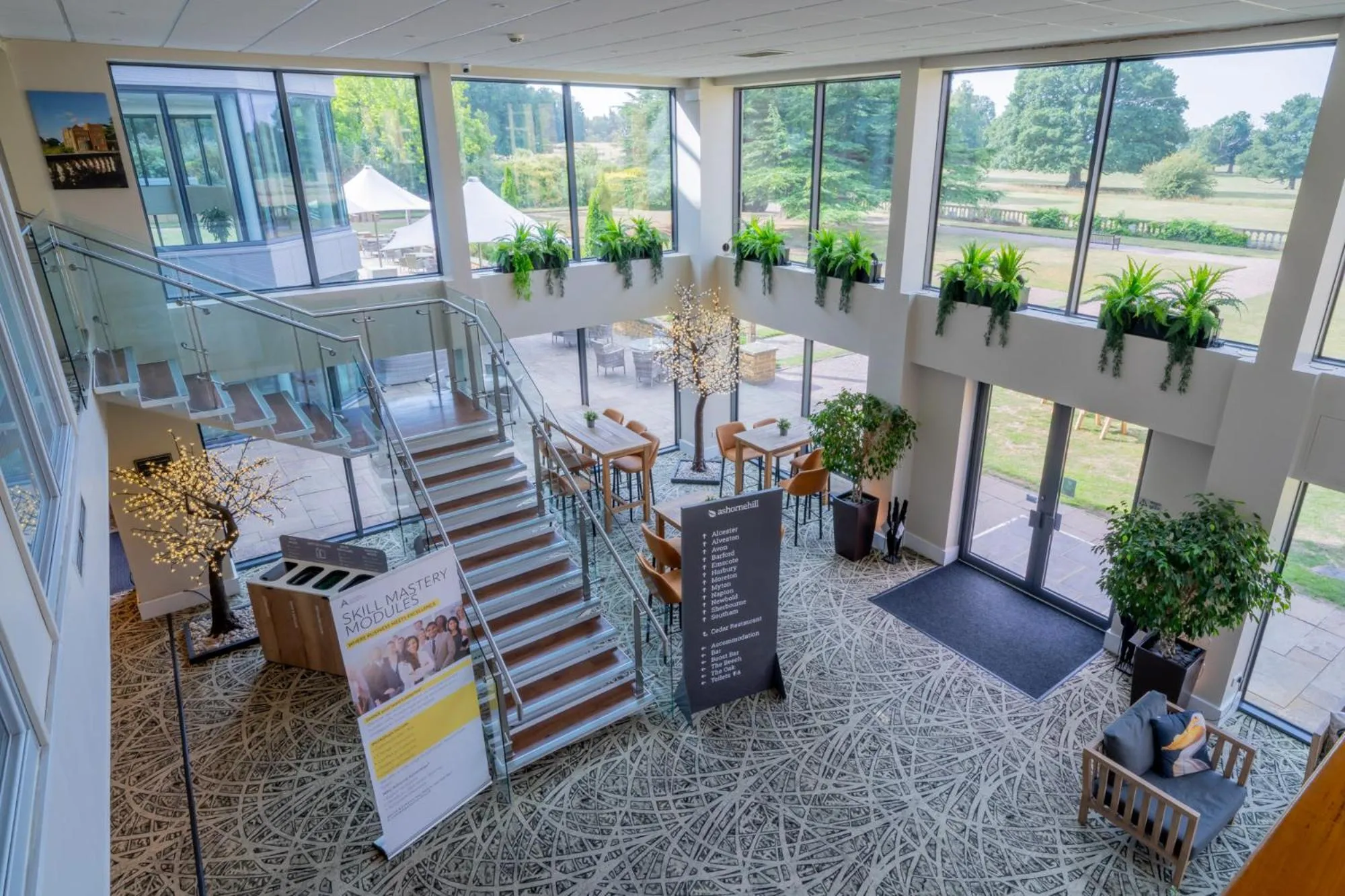 Communal lounge/ TV room in Ashorne Hill Leamington Spa