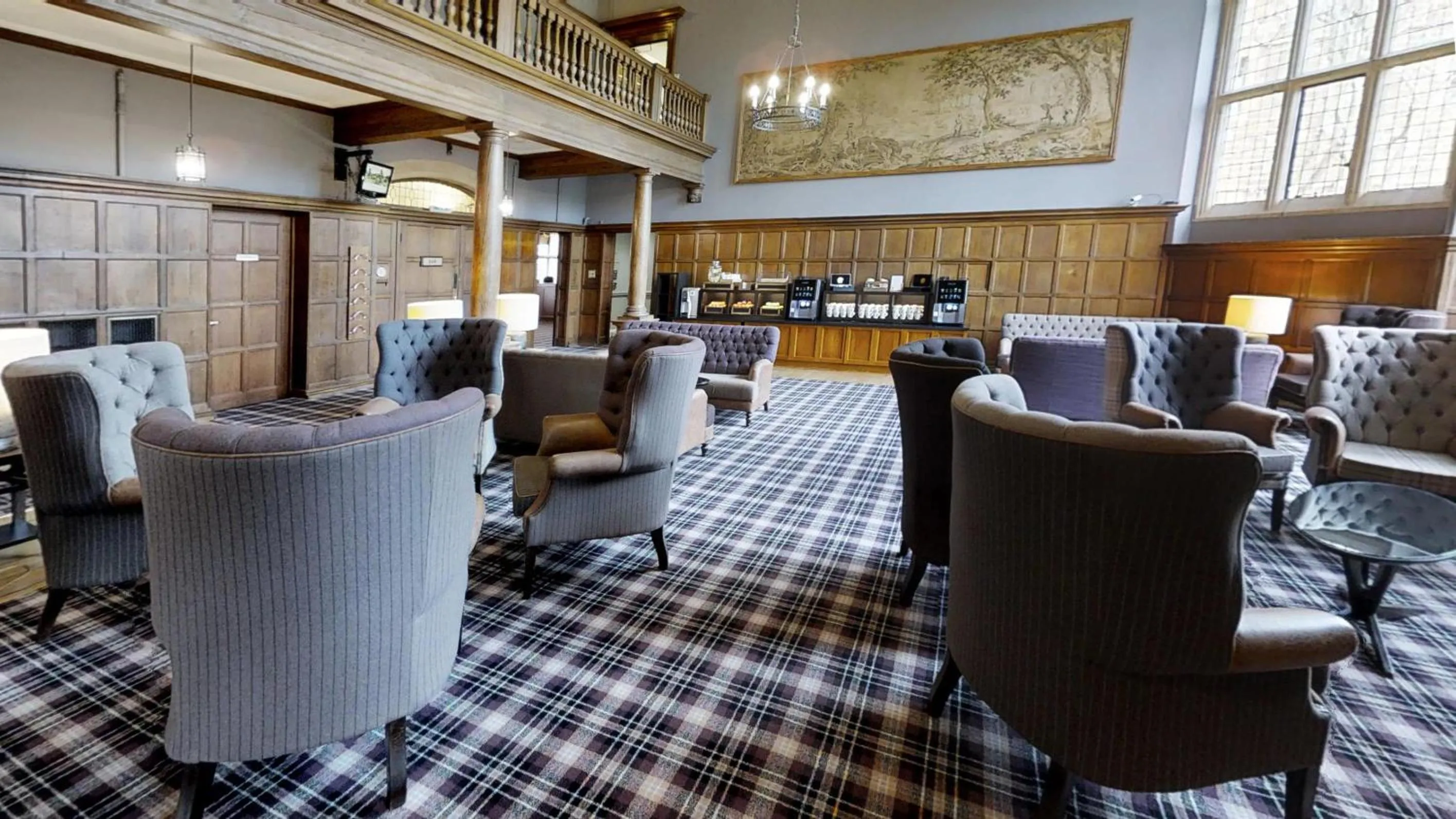 Communal lounge/ TV room in Ashorne Hill Leamington Spa