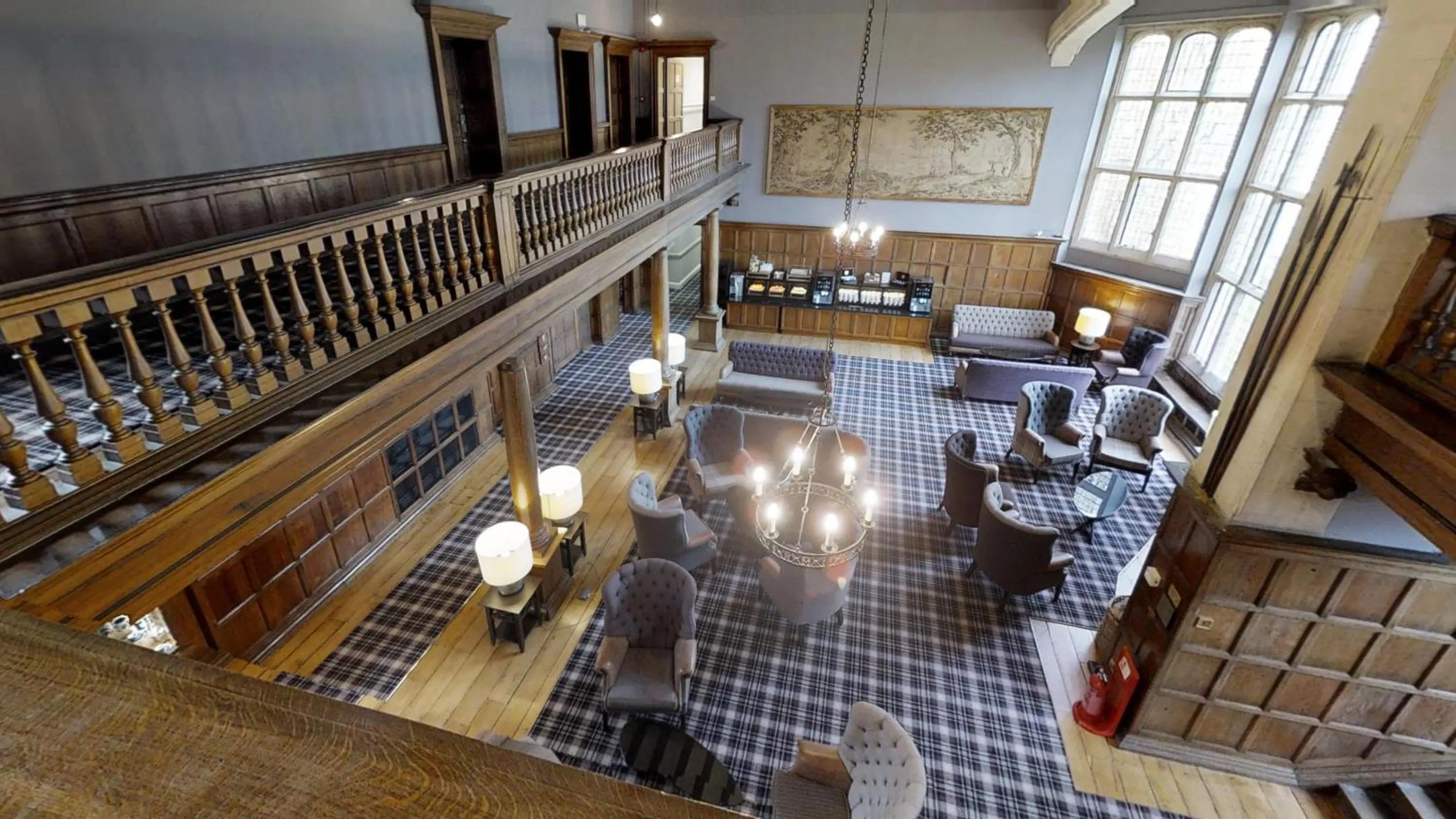 Communal lounge/ TV room in Ashorne Hill Leamington Spa