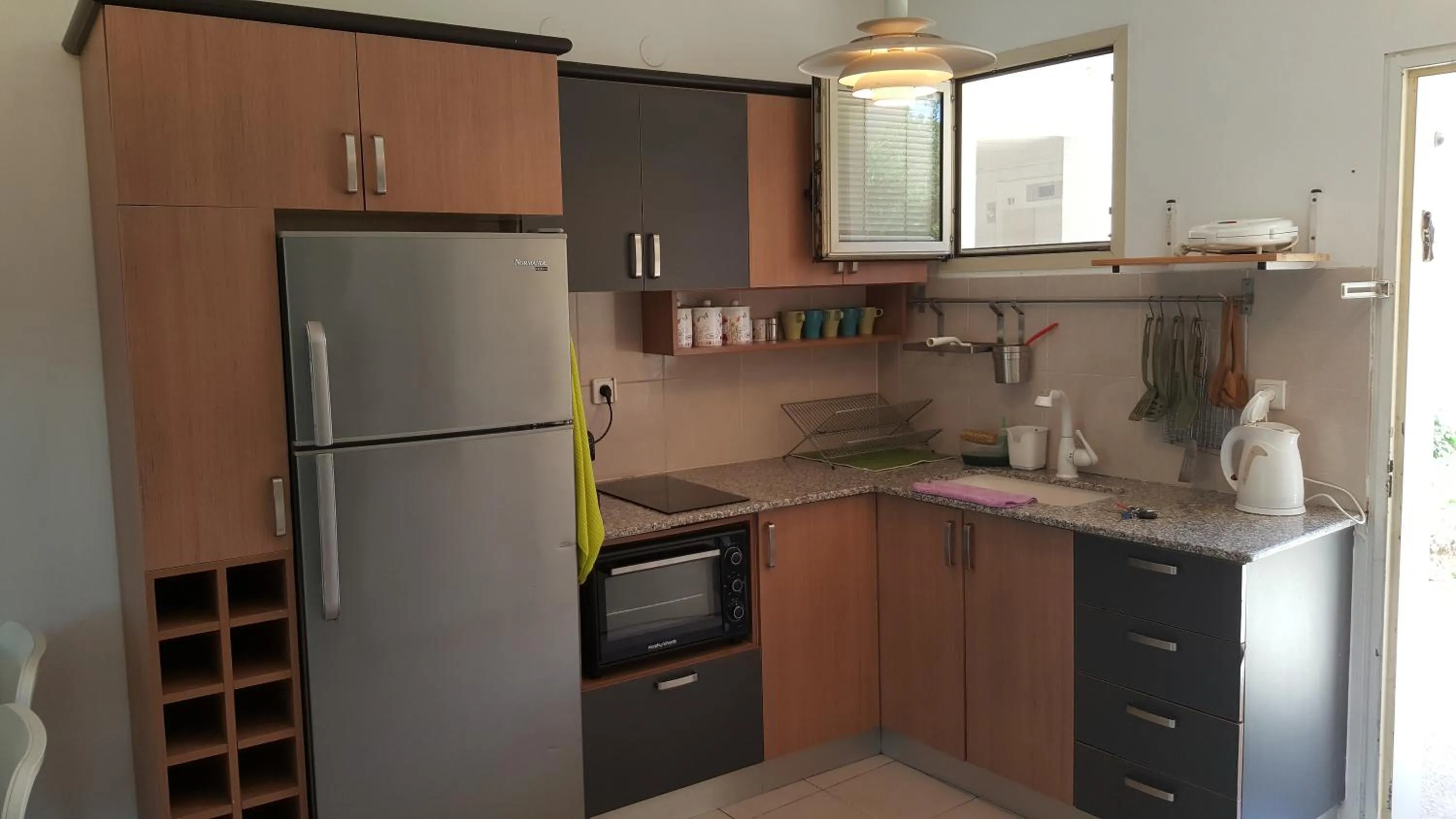 Kitchen or kitchenette in Neot Golf Caesarea Garden Apartment