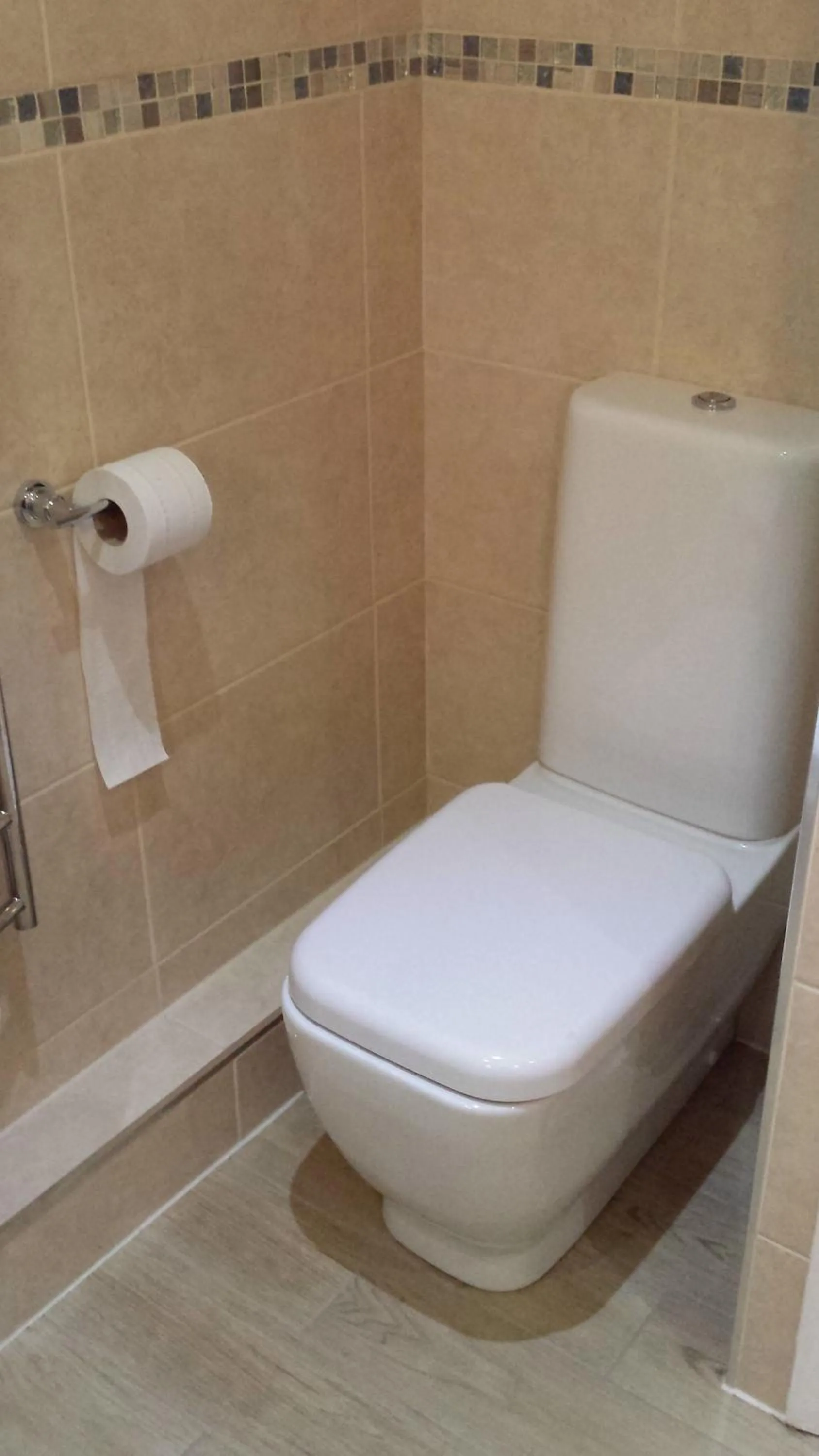 Toilet in Expanse Hotel