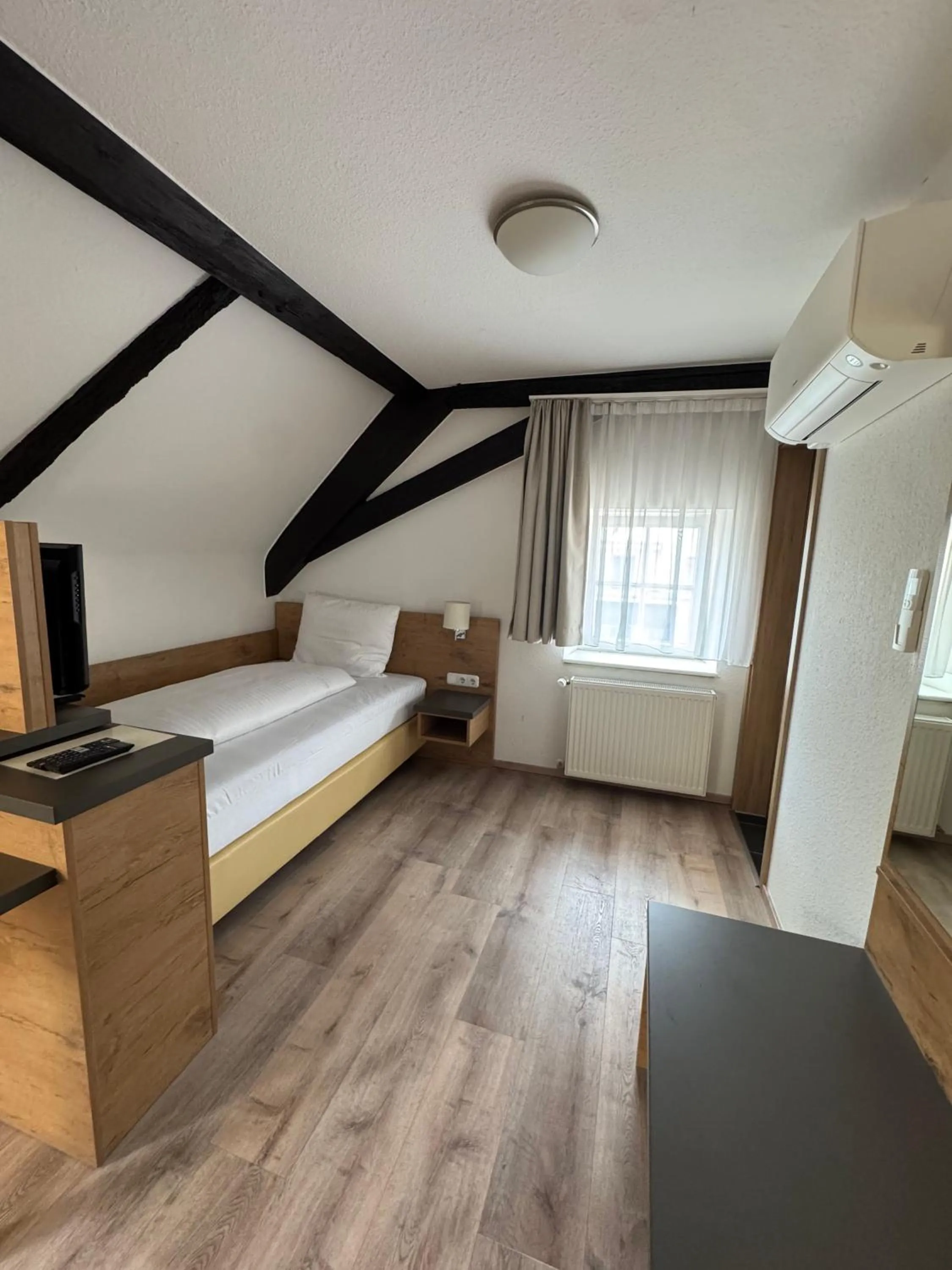 Bed in FLIP Boutique-Hotel near Basel - Modern Stay & Urban Food