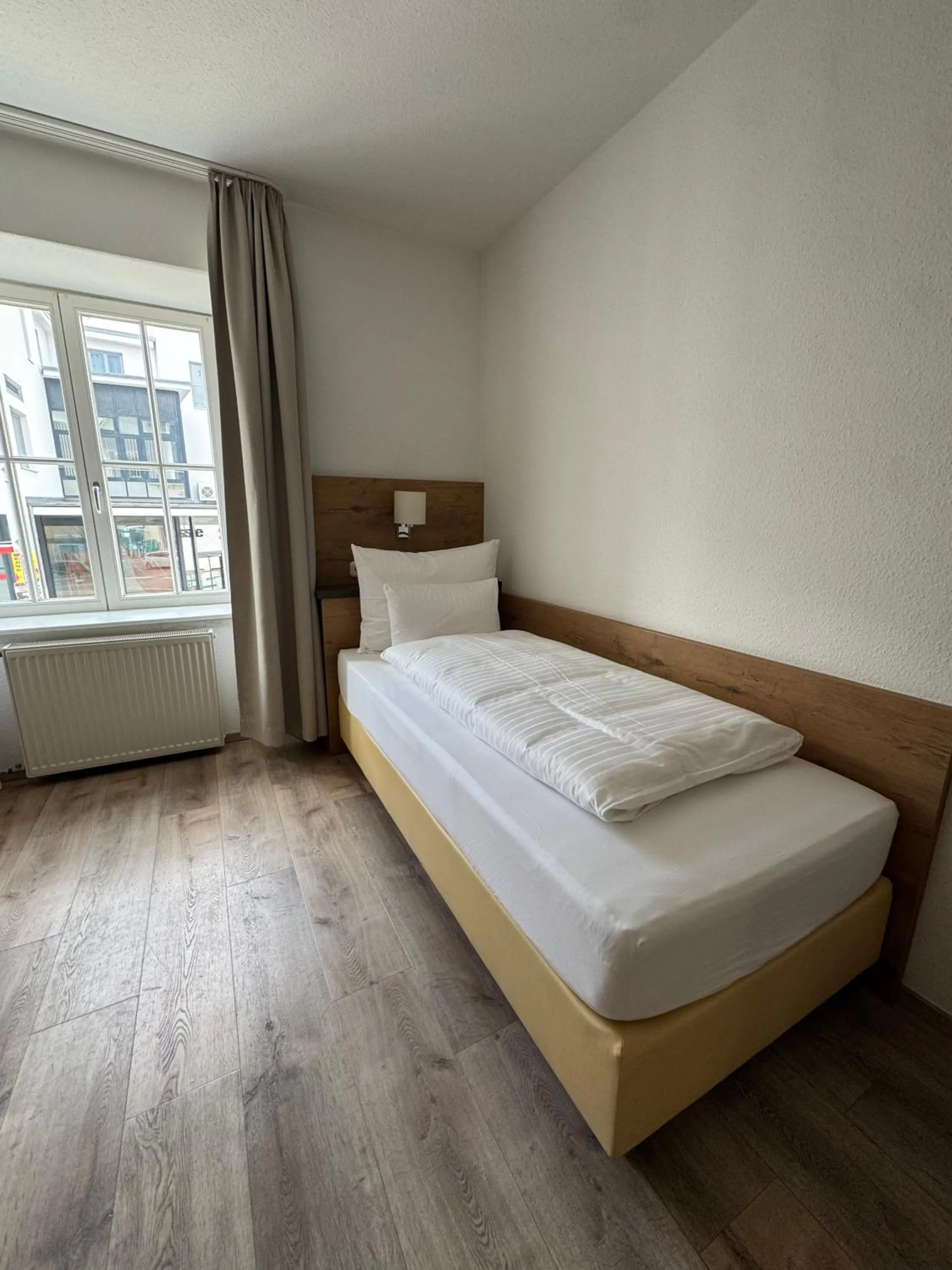 Bed in FLIP Boutique-Hotel near Basel - Modern Stay & Urban Food