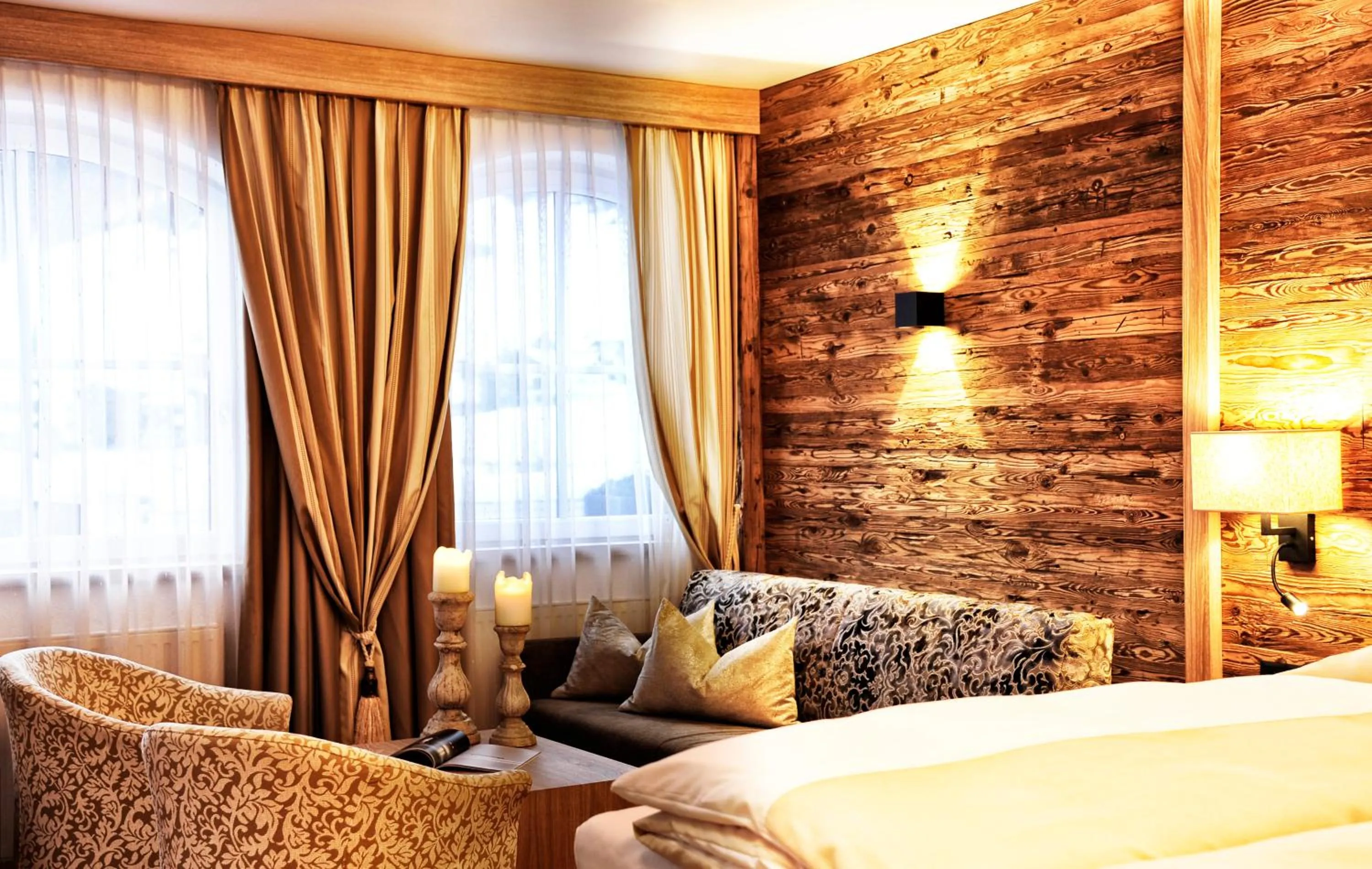 Seating area, Bed in Salnerhof Superior Lifestyle Resort