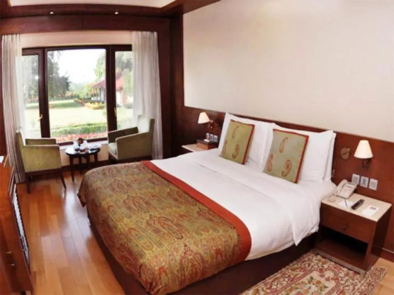 Bed in The LaLit Grand Palace Srinagar