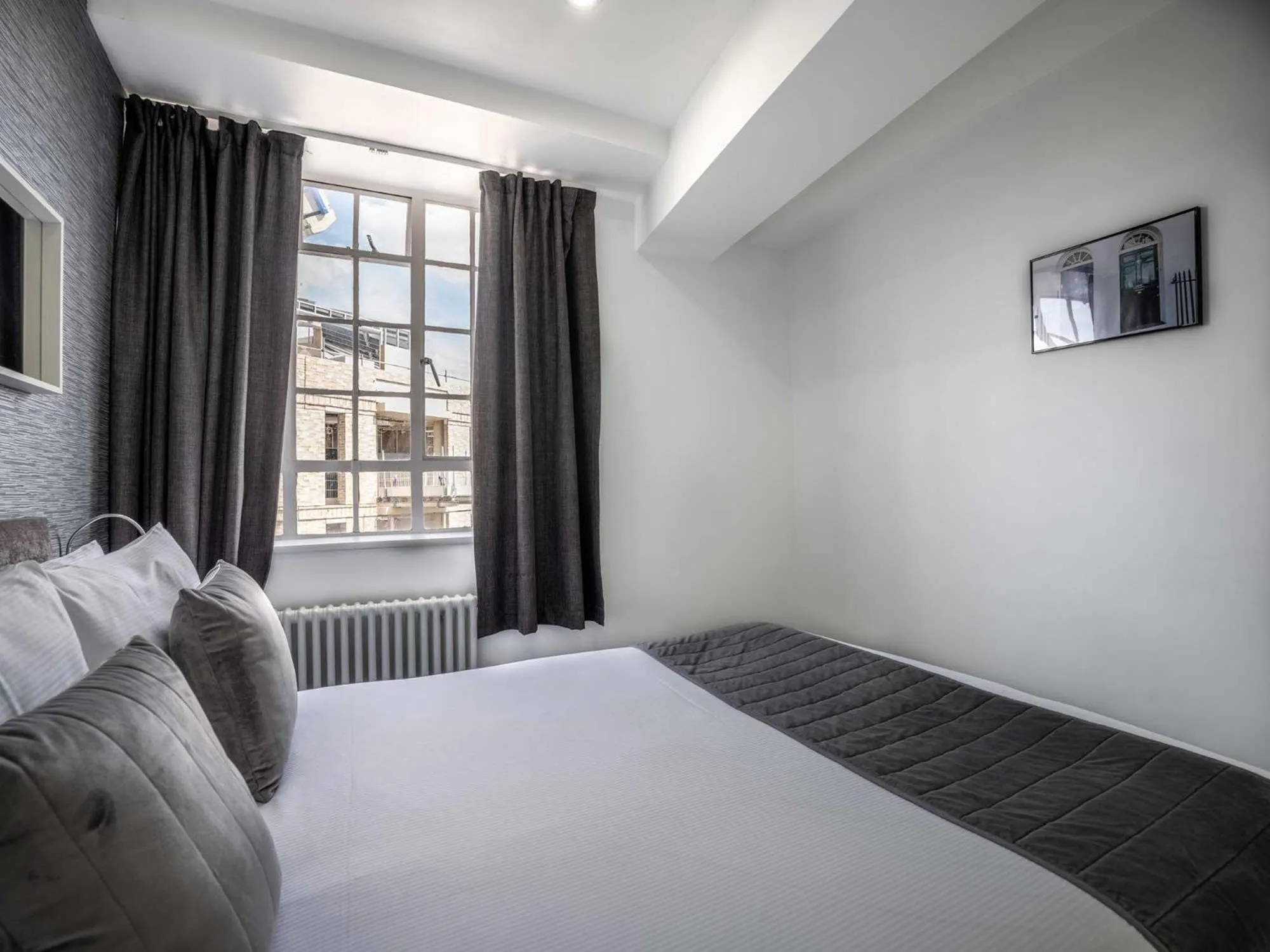 Bed in Chelsea Cloisters Serviced Apartments