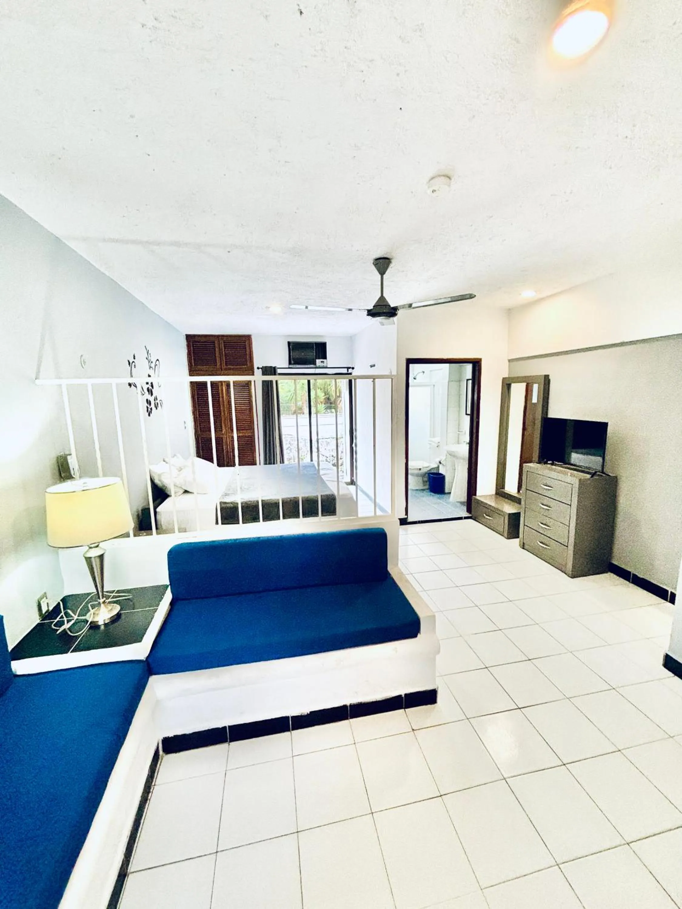 Living room, Bed in Hotel Pal Cozumel