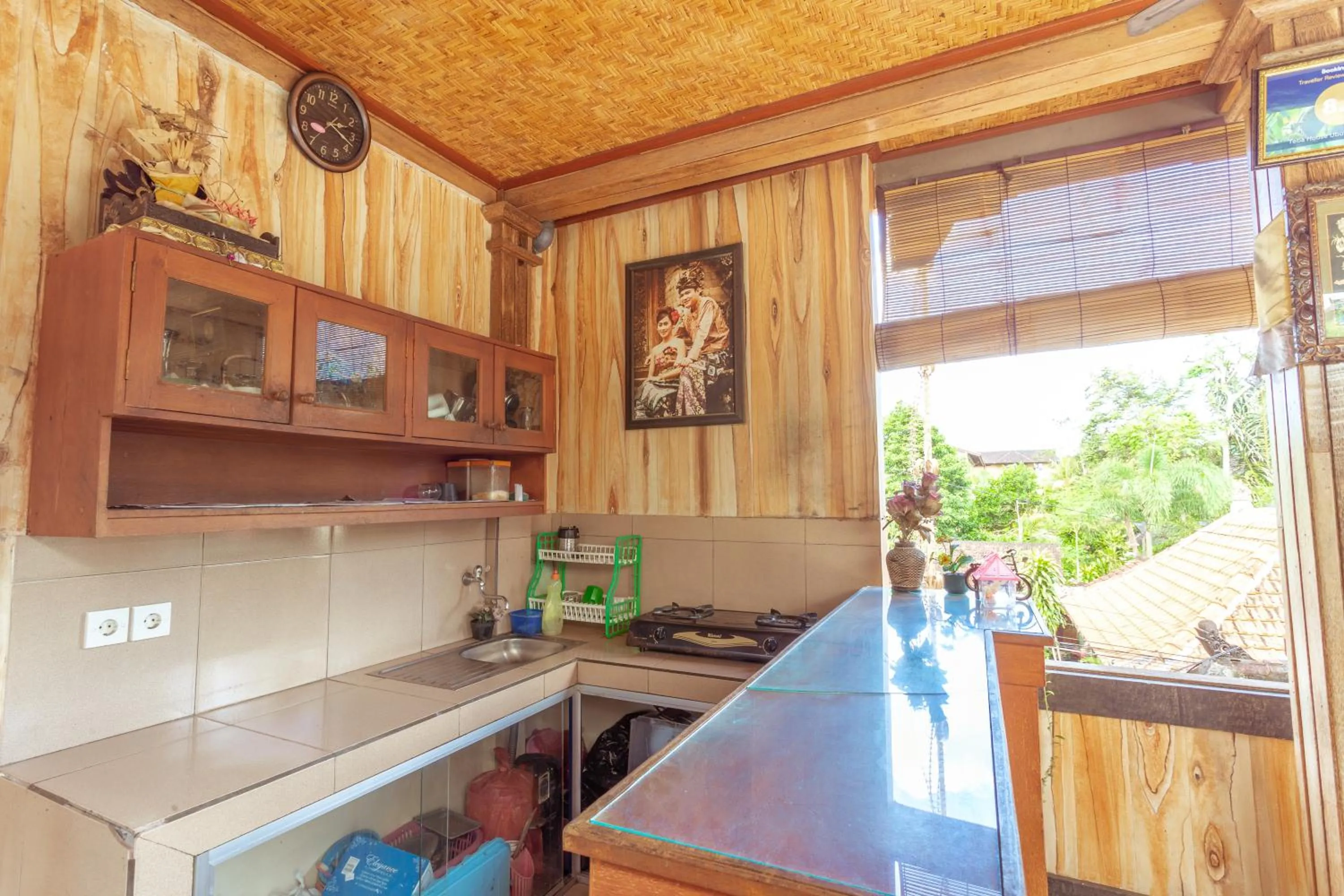 Kitchen or kitchenette in Teba House Ubud by ecommerceloka - CHSE Certified