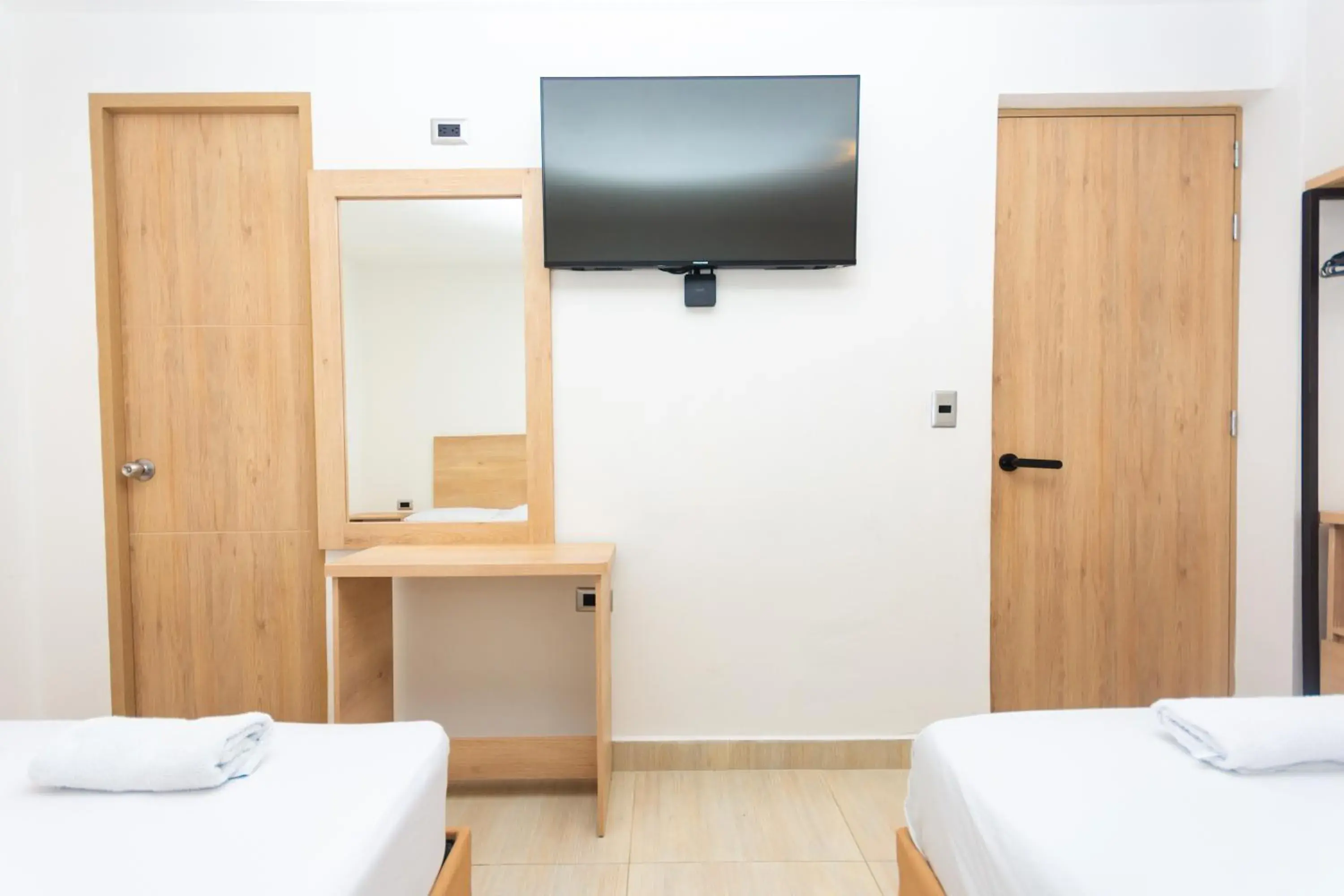 Superior Triple Room in Hotel Villa Real Superior Triple Room in Hotel Villa Real