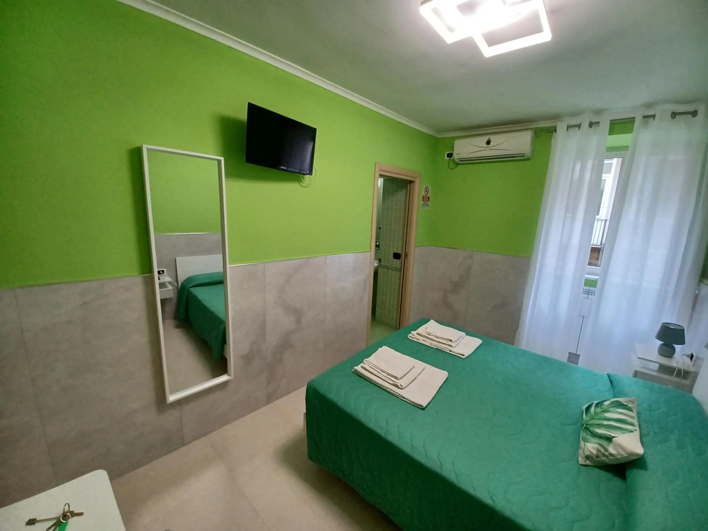 Photo of the whole room, Bed in B&B Quattro Palazzi Napoli Centro