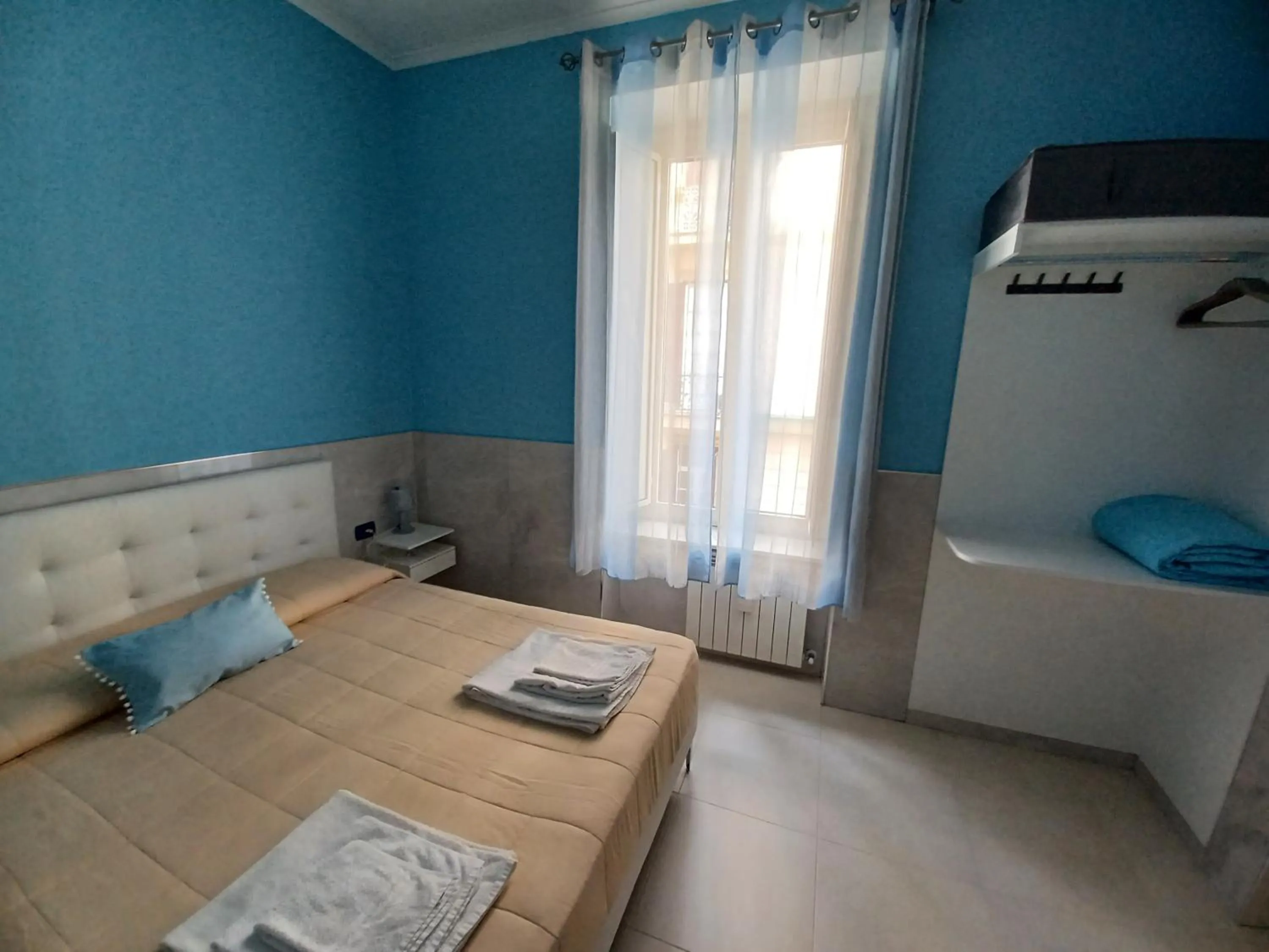 Photo of the whole room, Bed in B&B Quattro Palazzi Napoli Centro