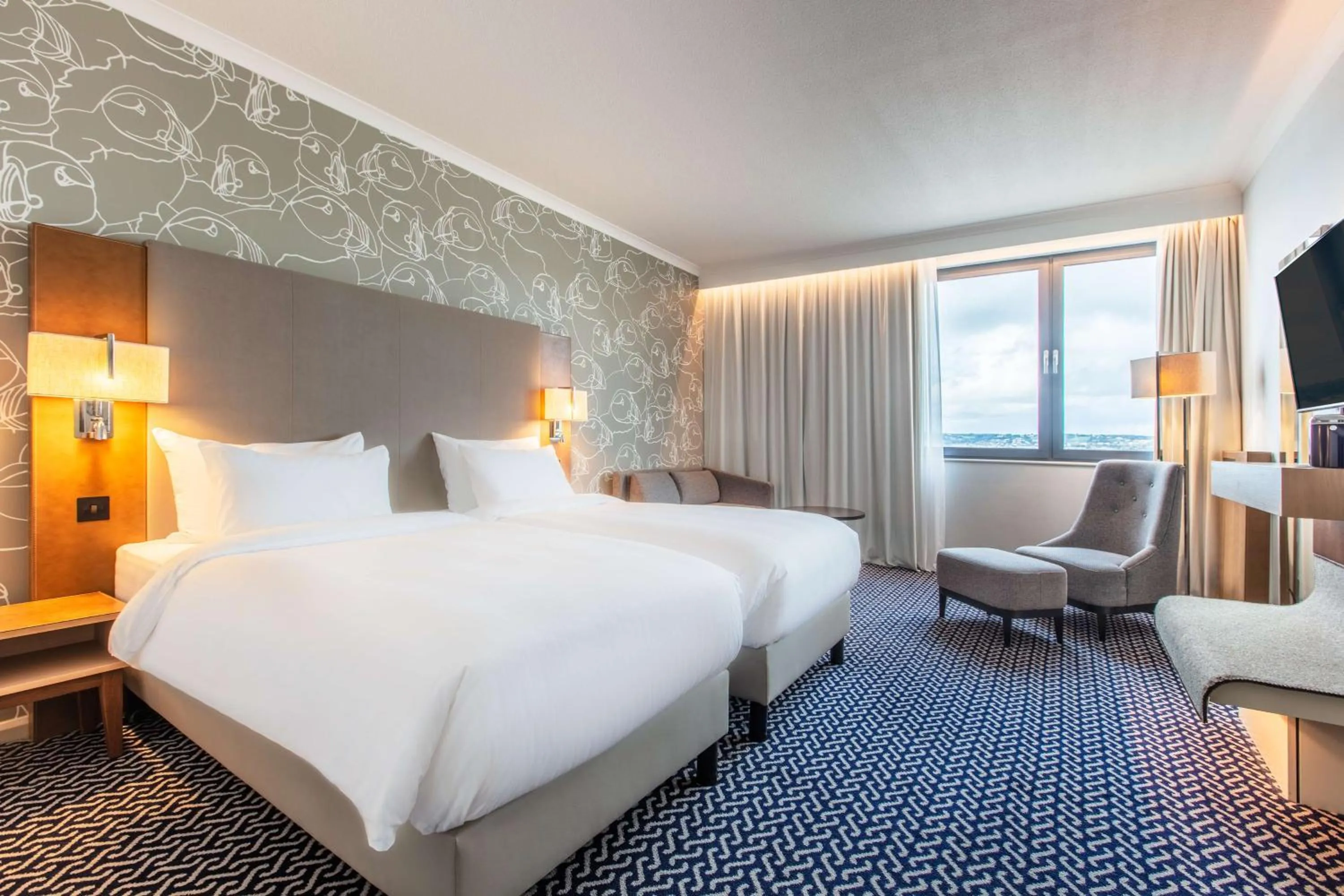 Photo of the whole room, Bed in Radisson Blu Waterfront Hotel, Jersey