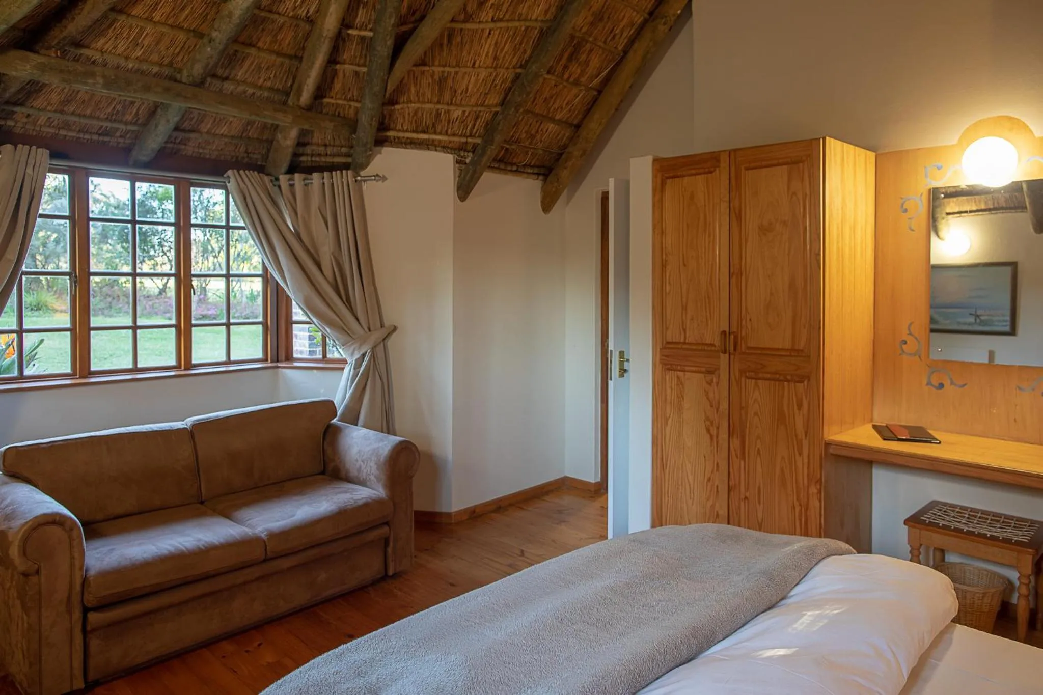 Bedroom in Coral Tree Cottages