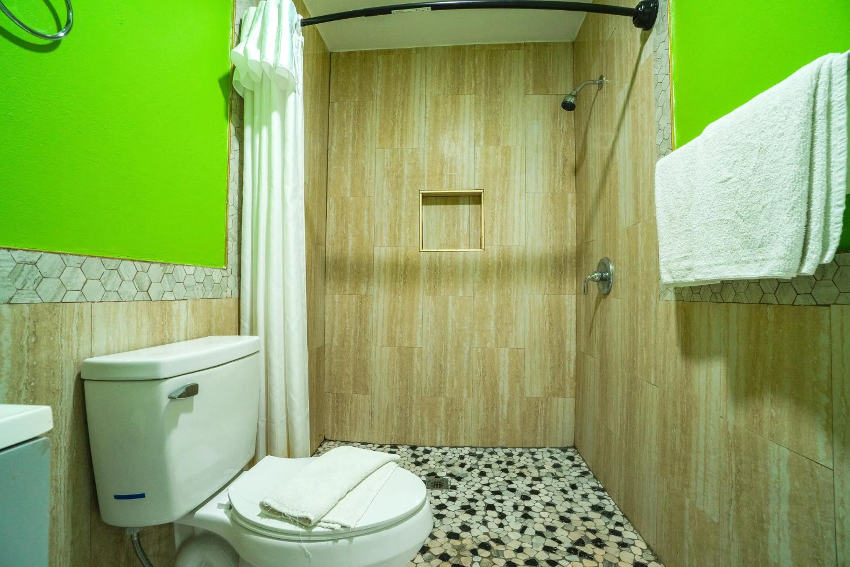 Bathroom in Plaza Motel Corpus Christi by OYO