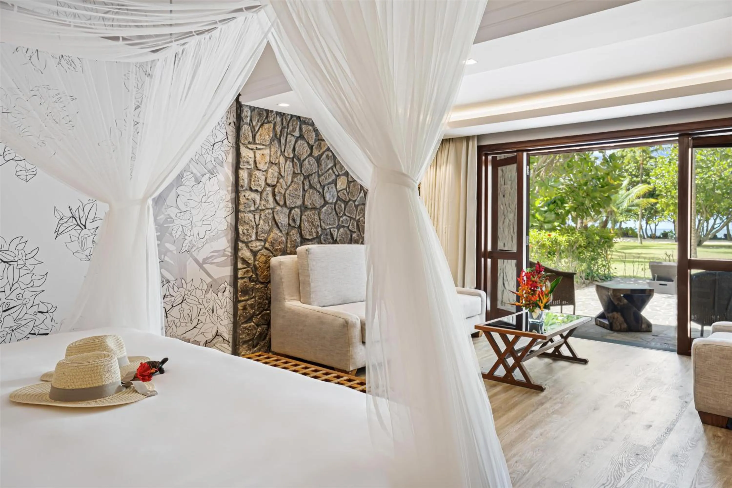 Photo of the whole room, Bed in Kempinski Seychelles Resort