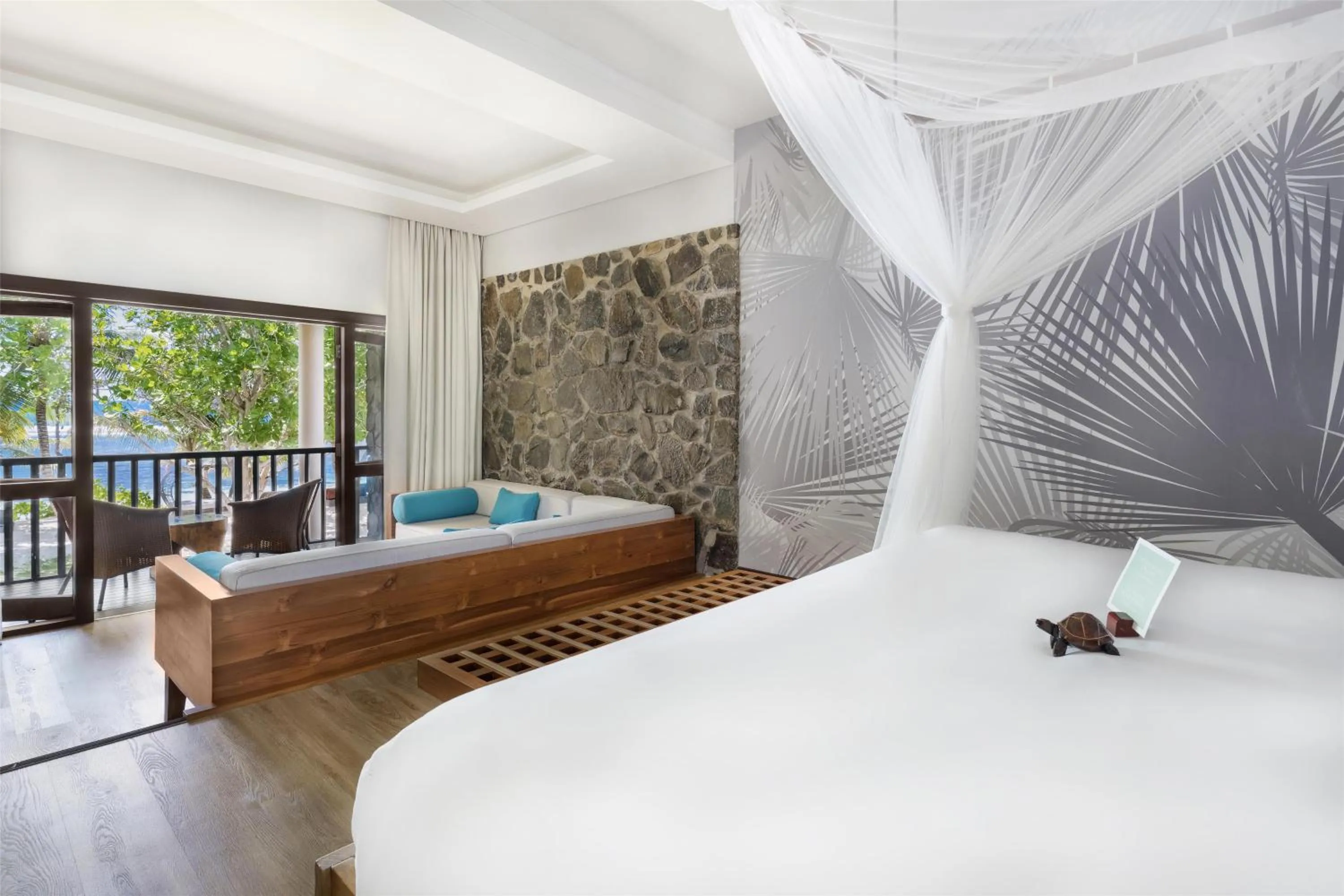Bedroom, Bed in Kempinski Seychelles Resort