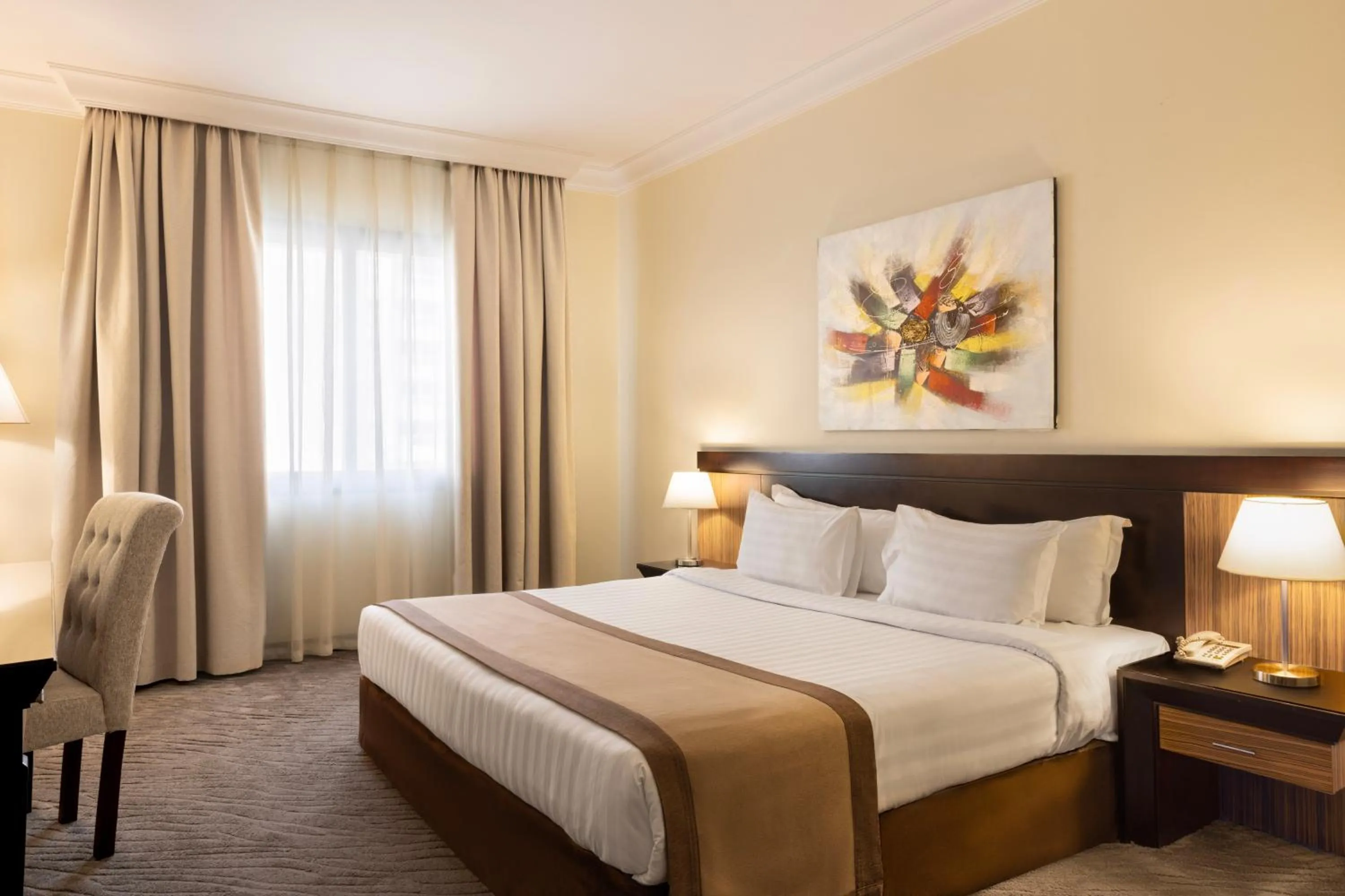 Bed in Dream City Hotel Apartments LLC