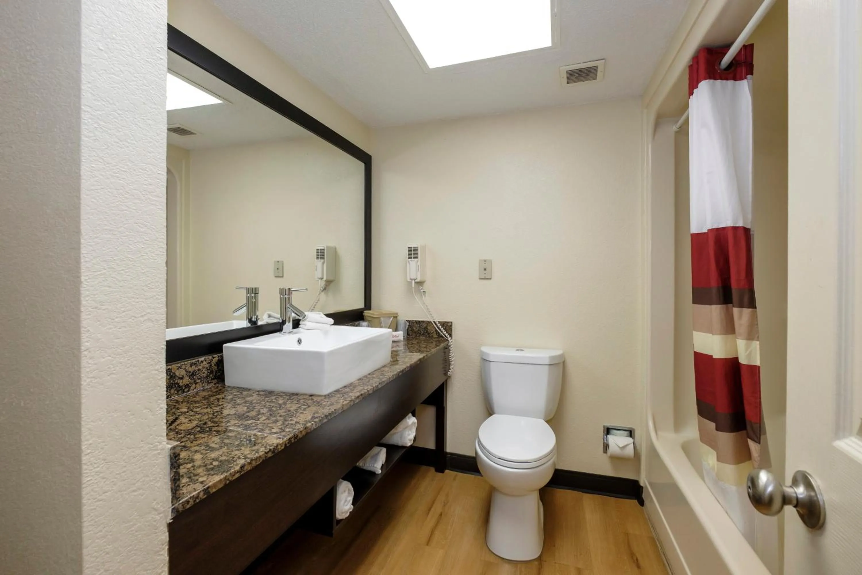 Bathroom in Red Roof Inn PLUS+ & Suites Opelika