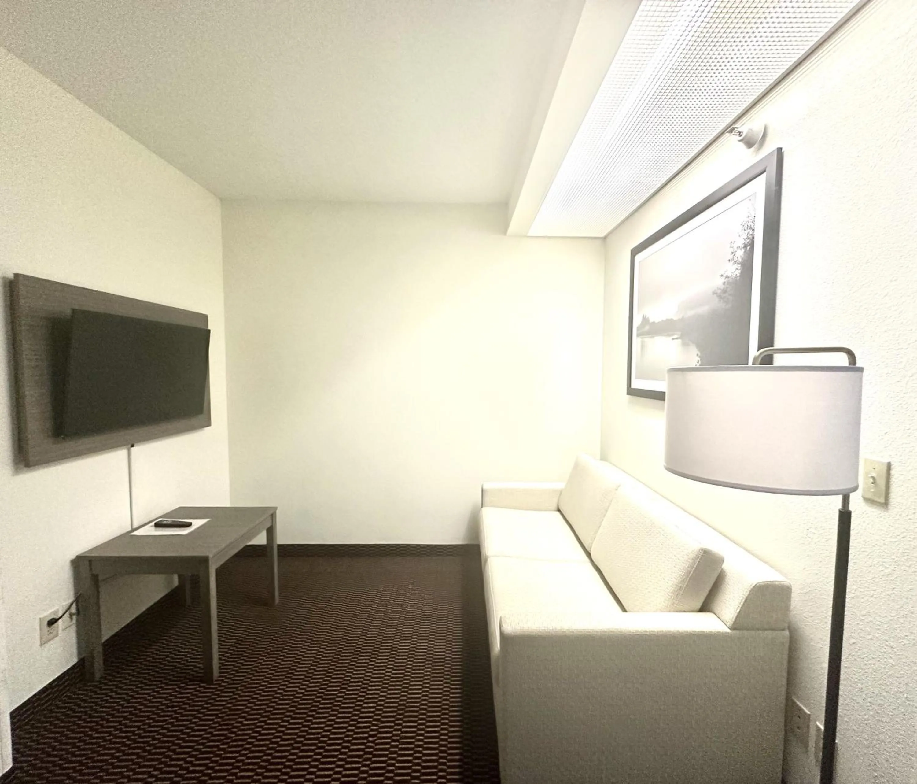 Living room in Ramada by Wyndham Columbia