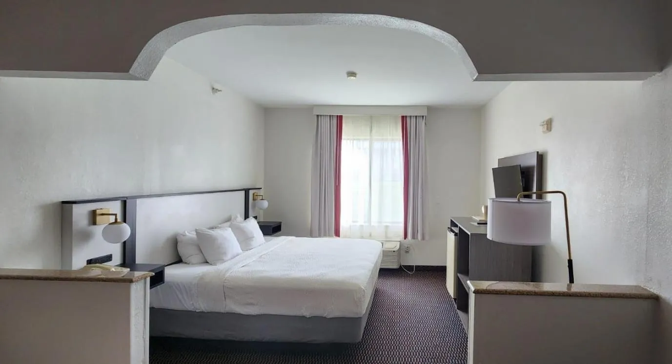 Bed in Ramada by Wyndham Columbia