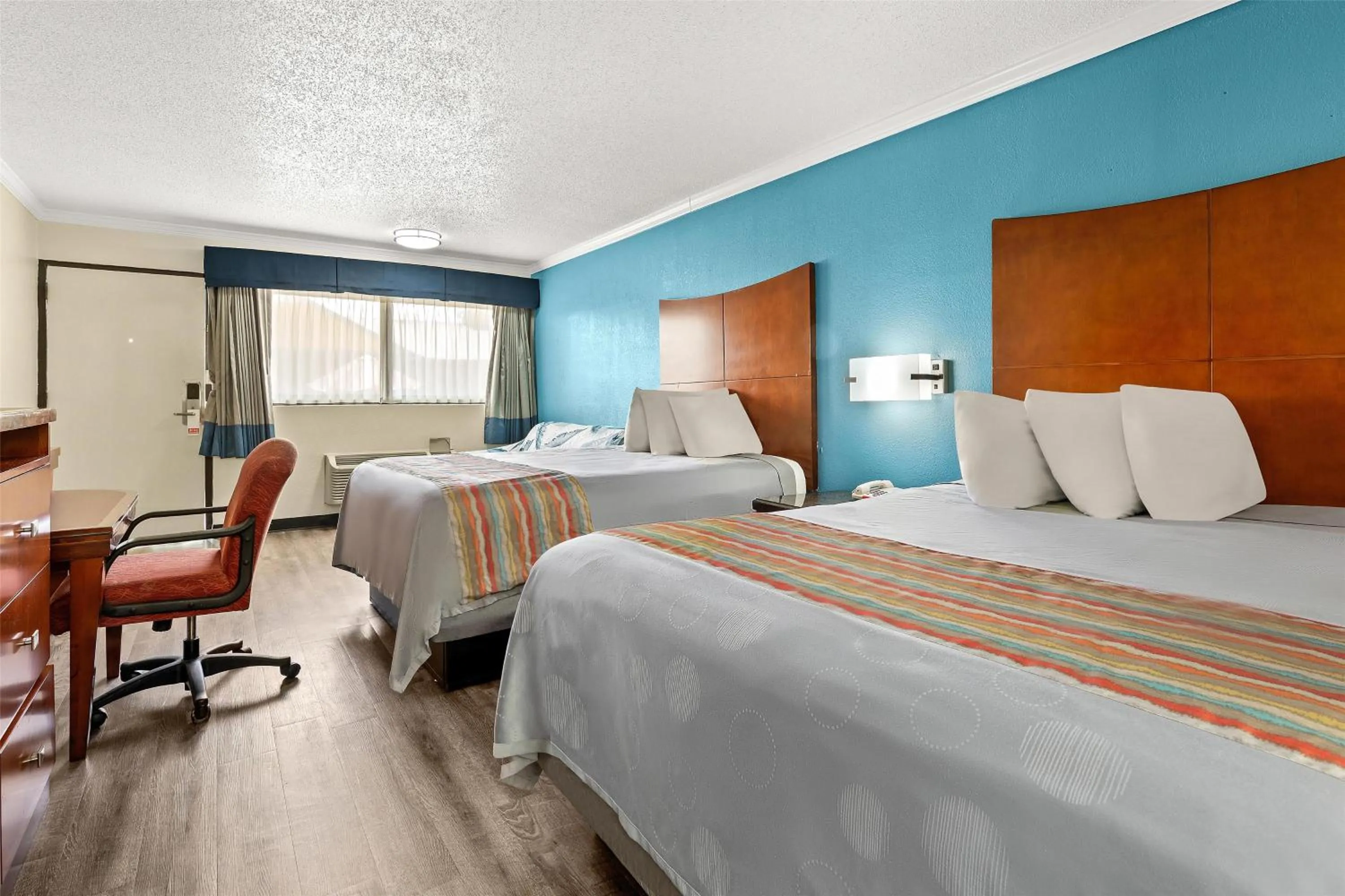 Bed in America's Best Value Inn and Suites