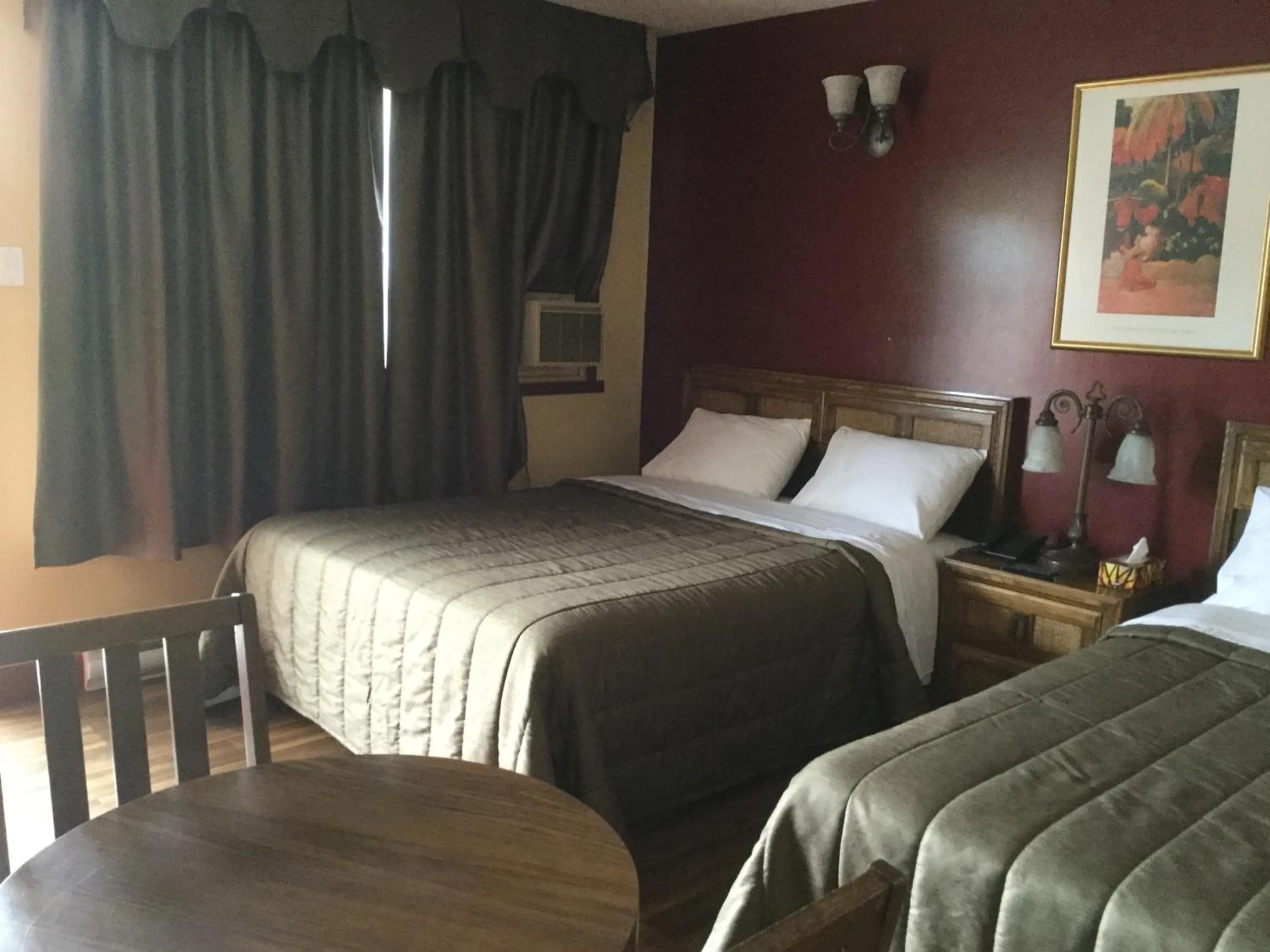 Bed in Hotel Motel Hospitalité