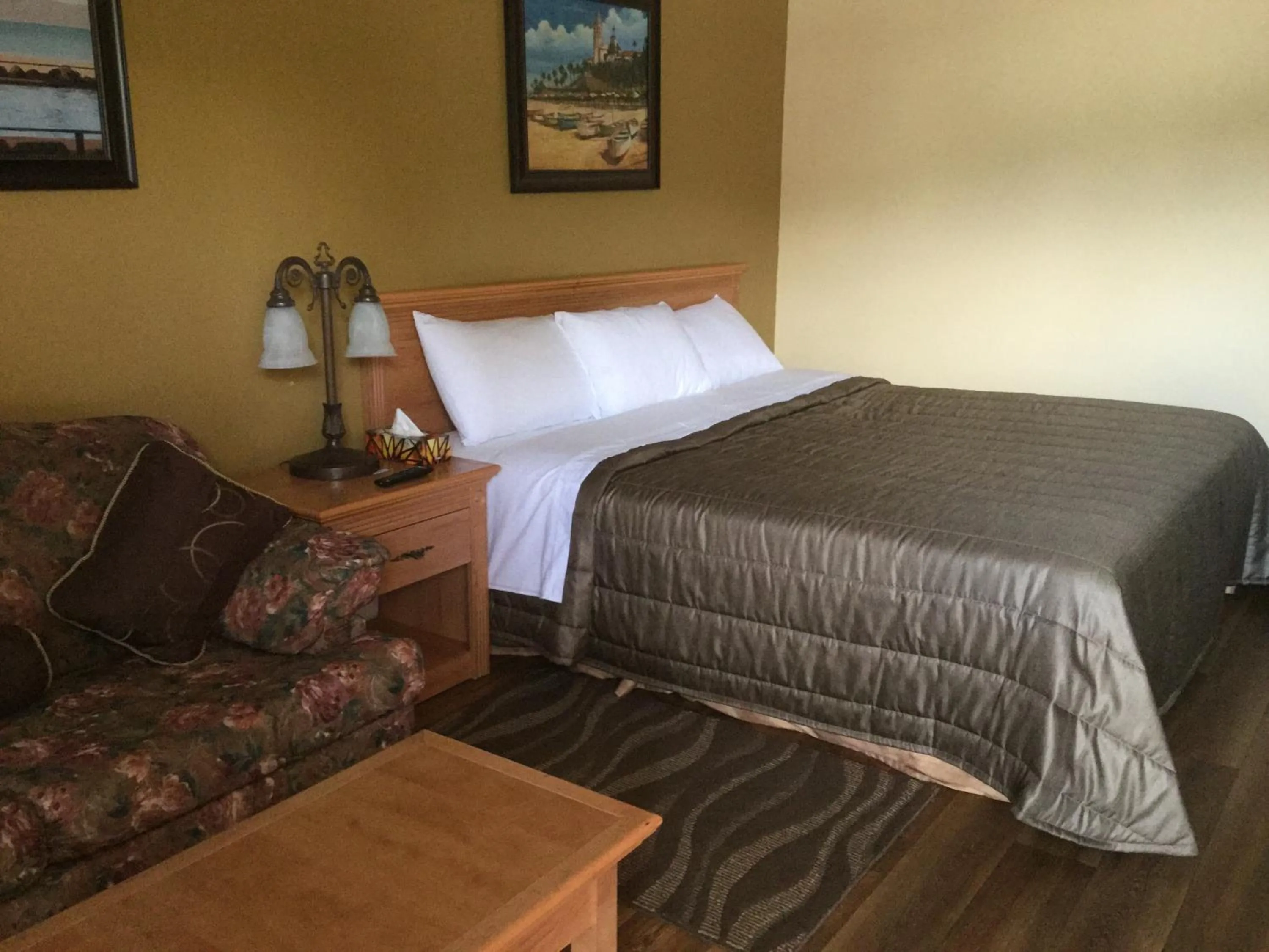 Bed in Hotel Motel Hospitalité