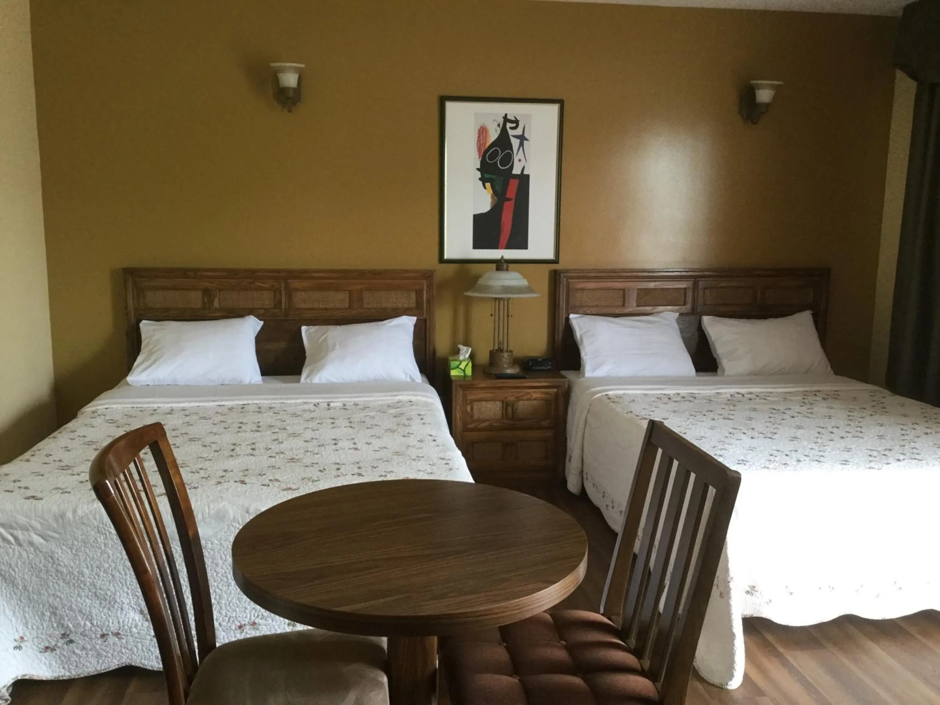 Bed in Hotel Motel Hospitalité