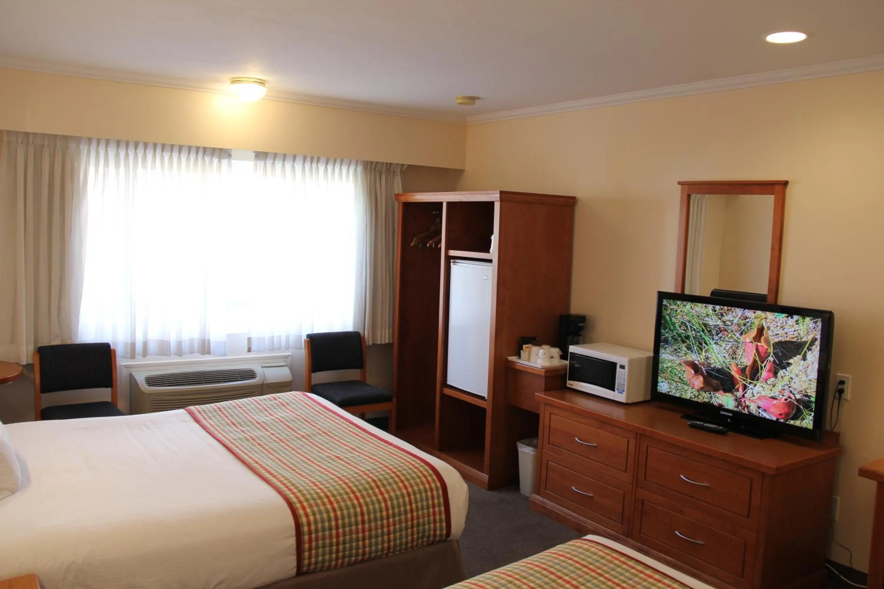 Bed in Travelodge by Wyndham Kamloops