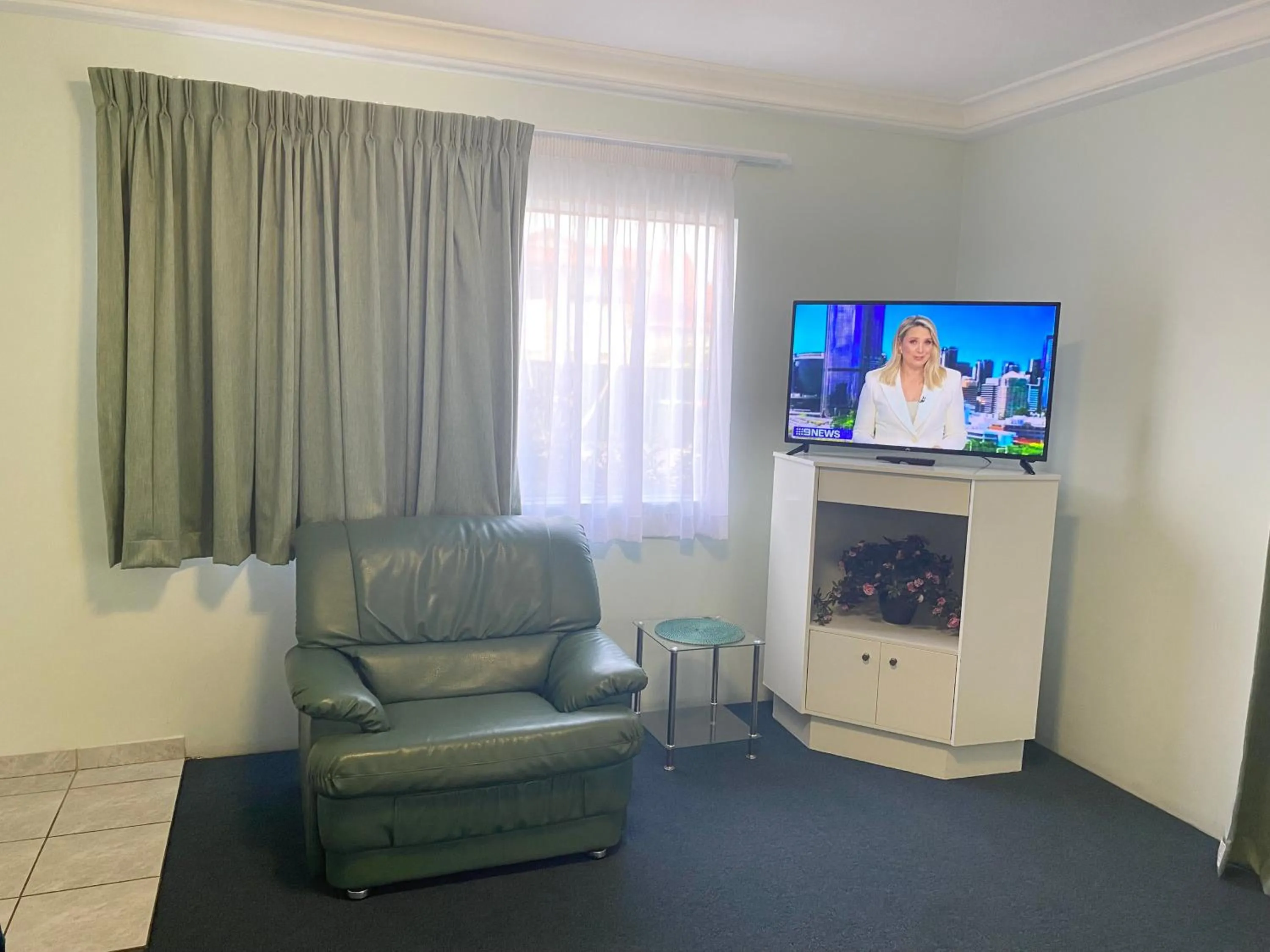 Living room in Runaway Bay Motor Inn