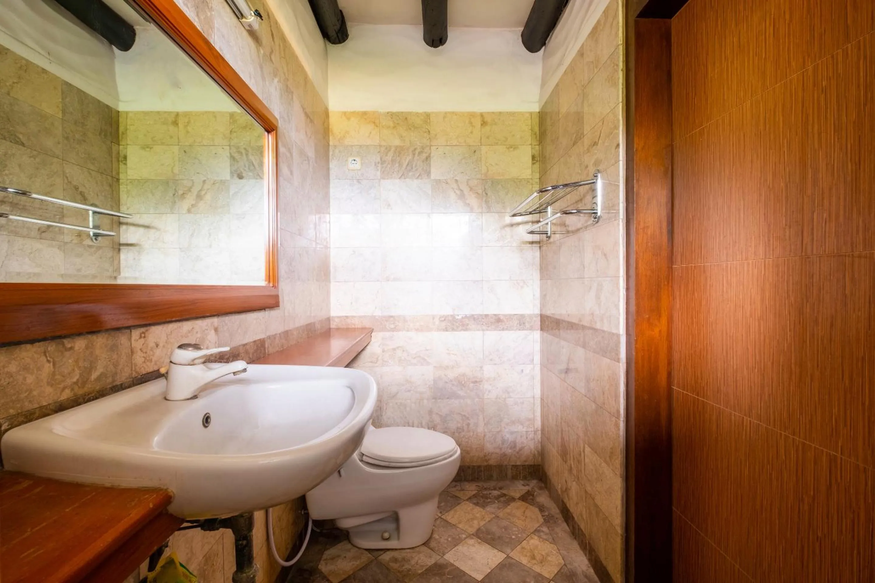 Bathroom in Capital O 2640 Cottage GS Rumah Kayu Syariah