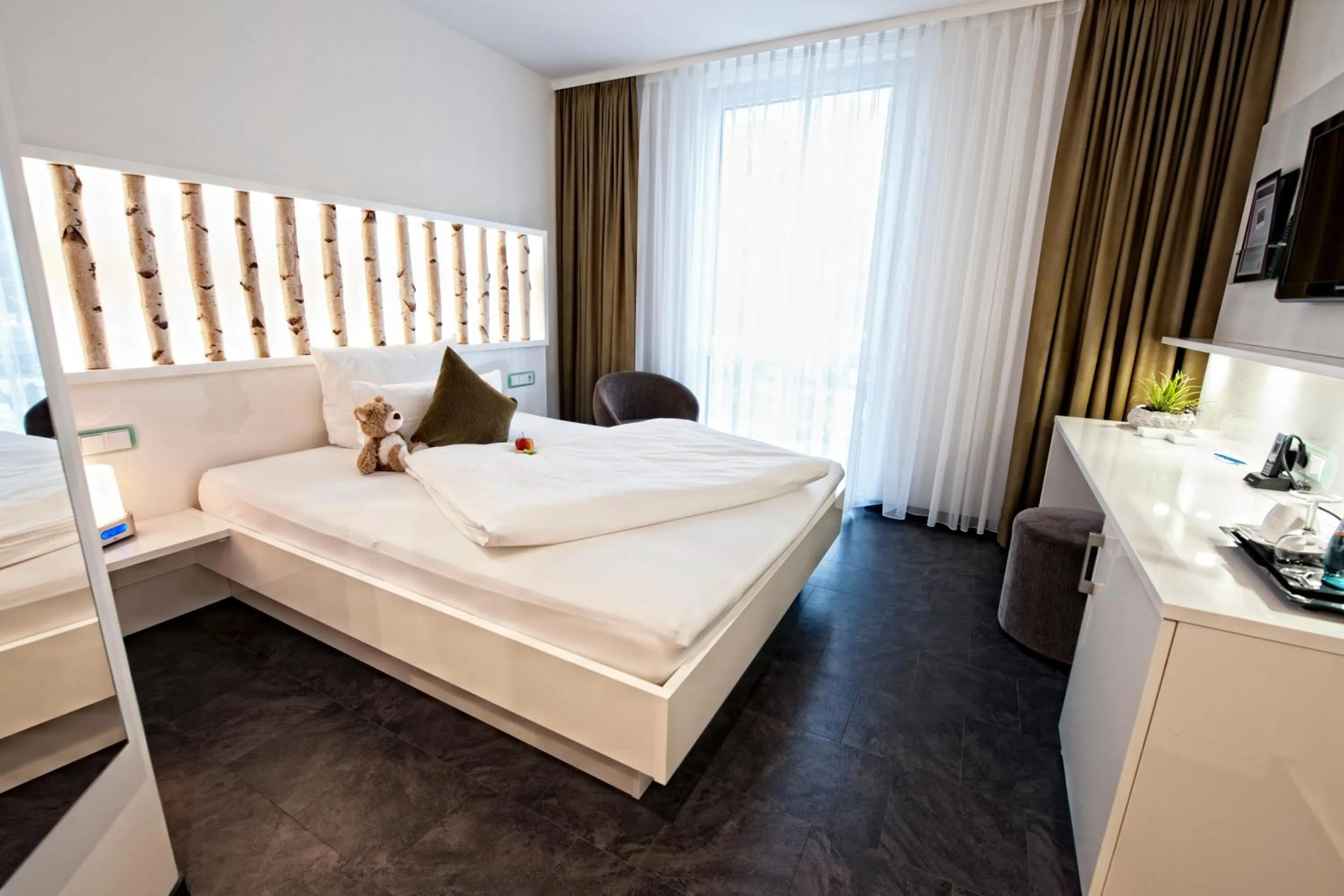 Living room, Bed in Hotel Jungstil