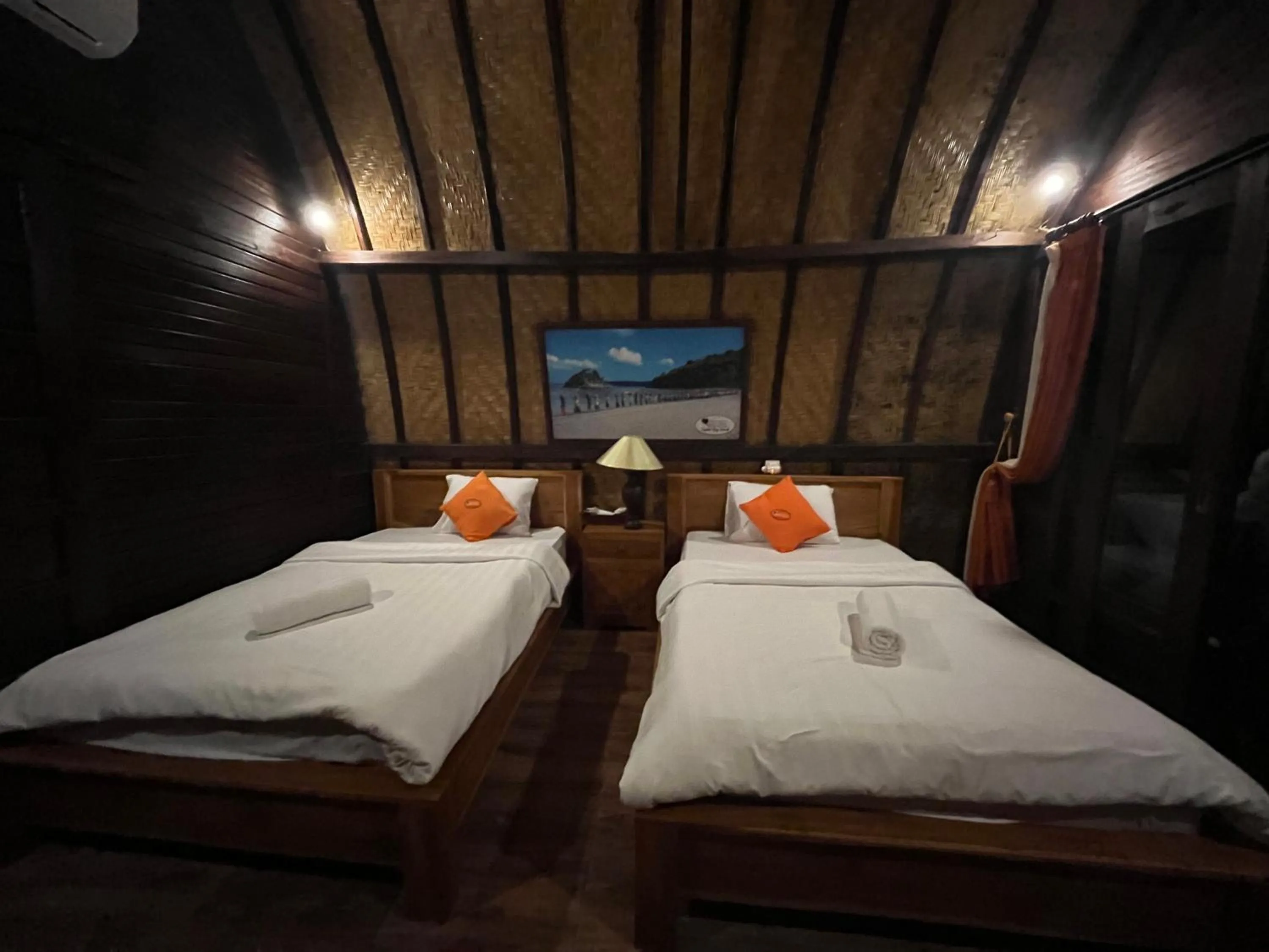 Bed in Holy Hills Bungalow Nusa Penida