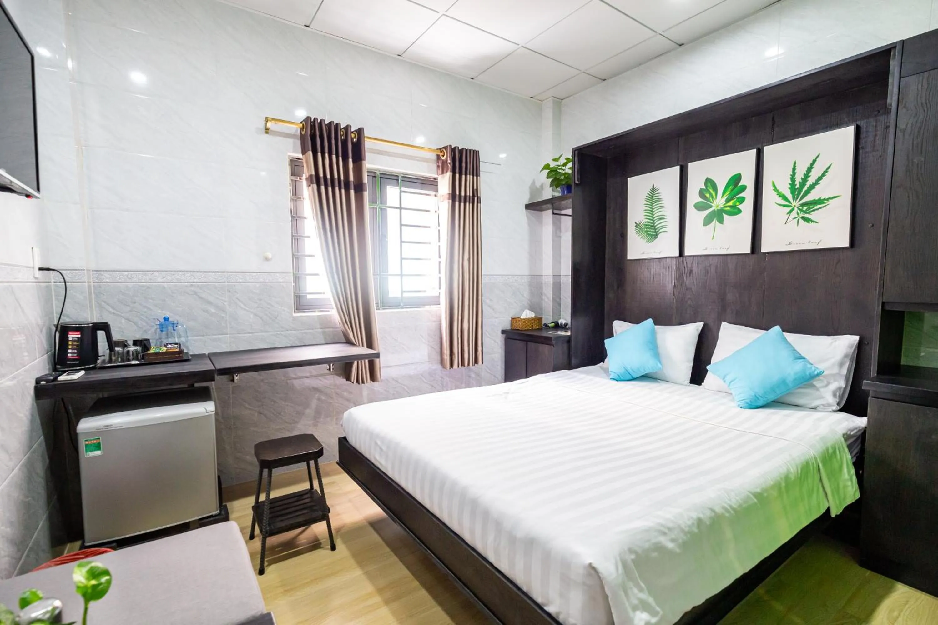 Photo of the whole room, Bed in Cola's Homestay