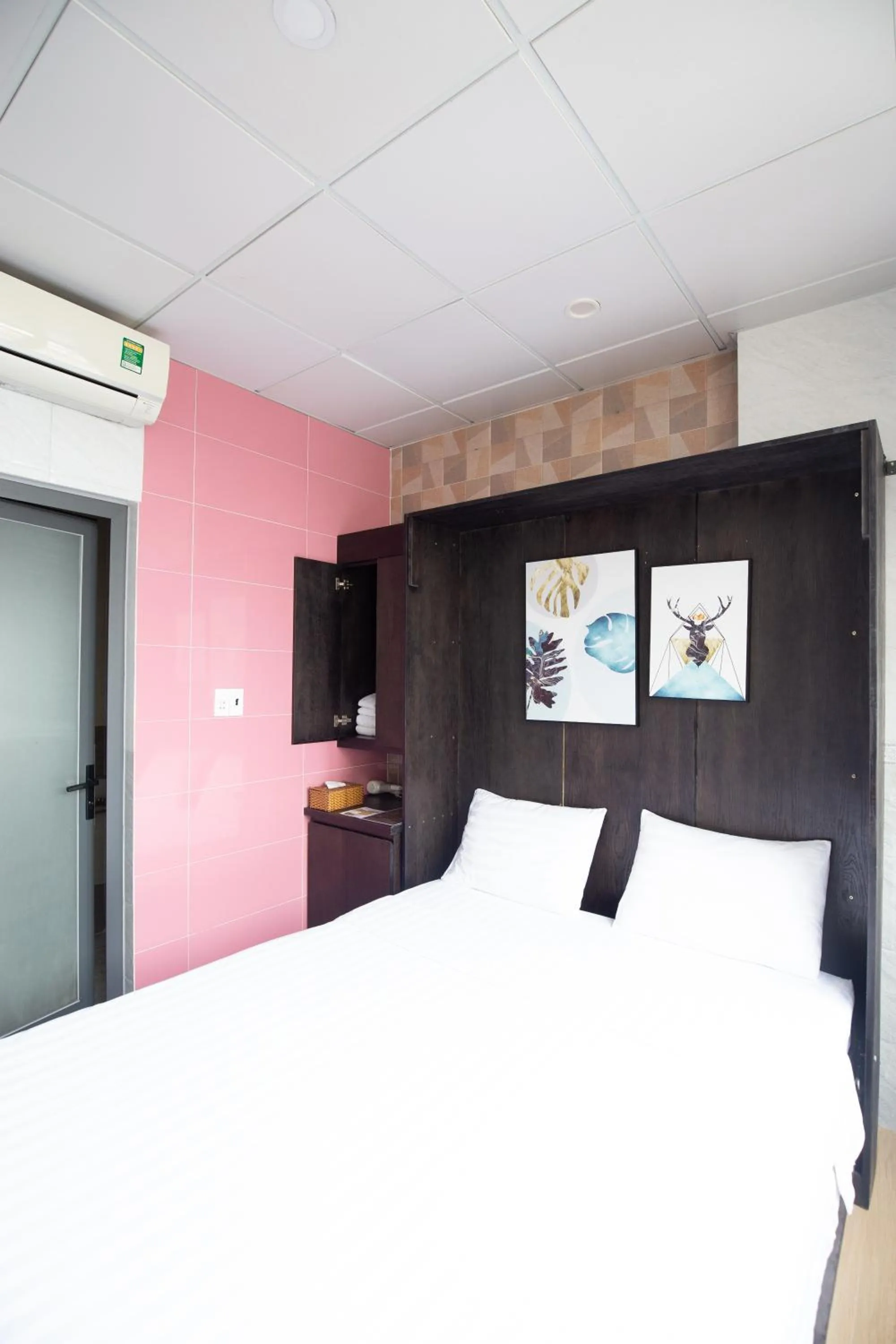 Photo of the whole room, Bed in Cola's Homestay