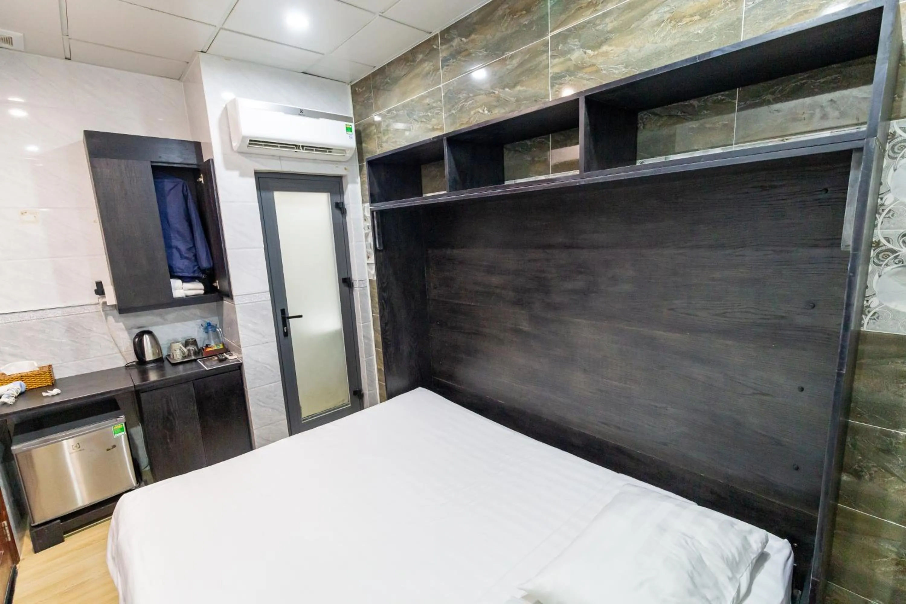 Photo of the whole room, Bed in Cola's Homestay