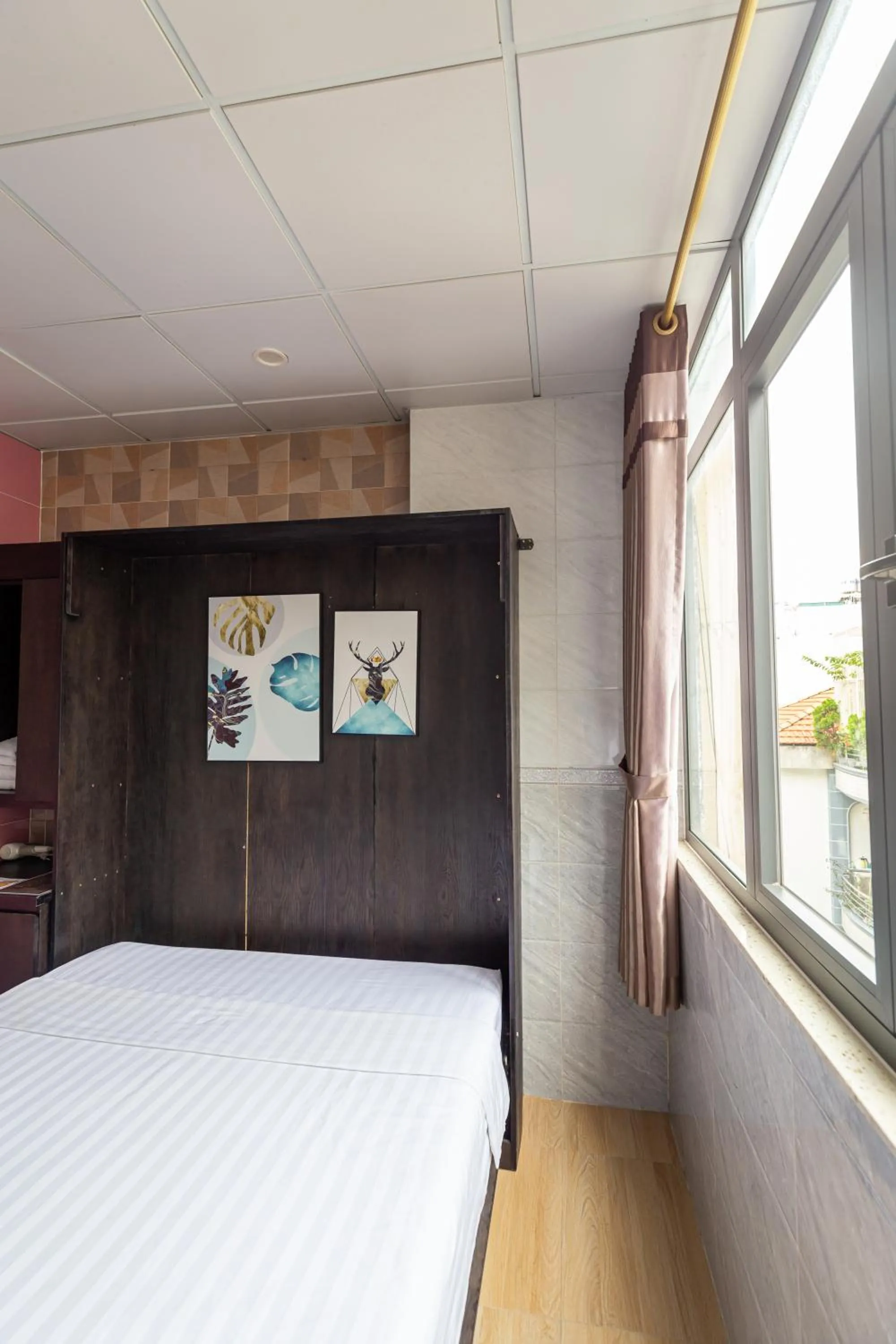 Photo of the whole room, Bed in Cola's Homestay