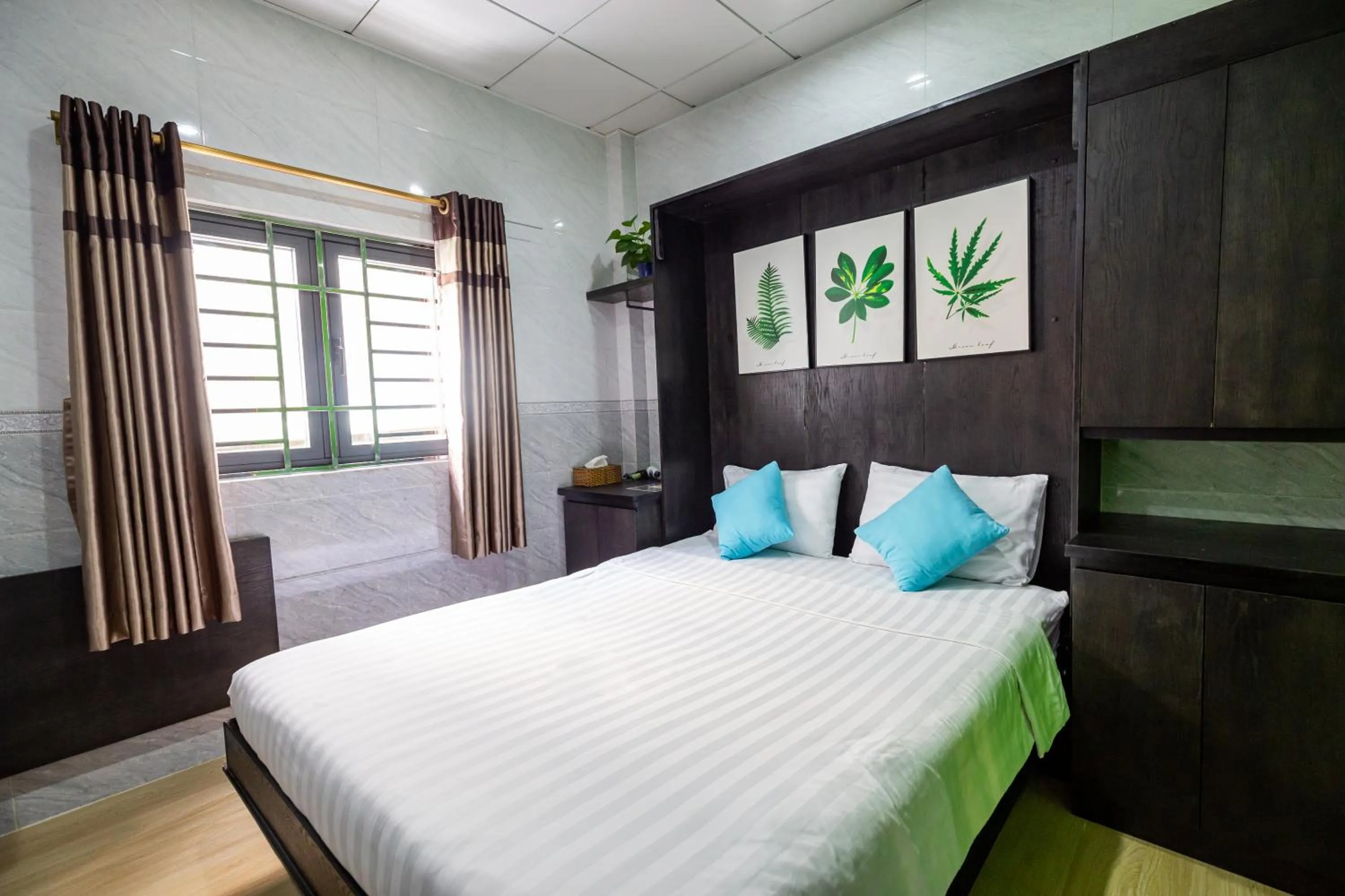 Photo of the whole room, Bed in Cola's Homestay